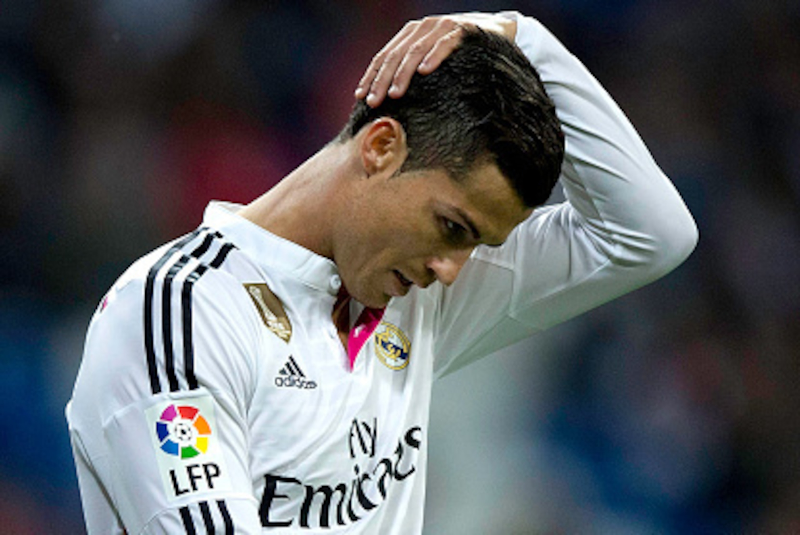MADRID, SPAIN - APRIL 29:  Cristiano Ronaldo of Real Madrid CF reacts defeated as he leaves the pitch after the La Liga match between Real Madrid CF and UD Almeria at Estadio Santiago Bernabeu on April 29, 2015 in Madrid, Spain.  (Photo by Gonzalo Arroyo 