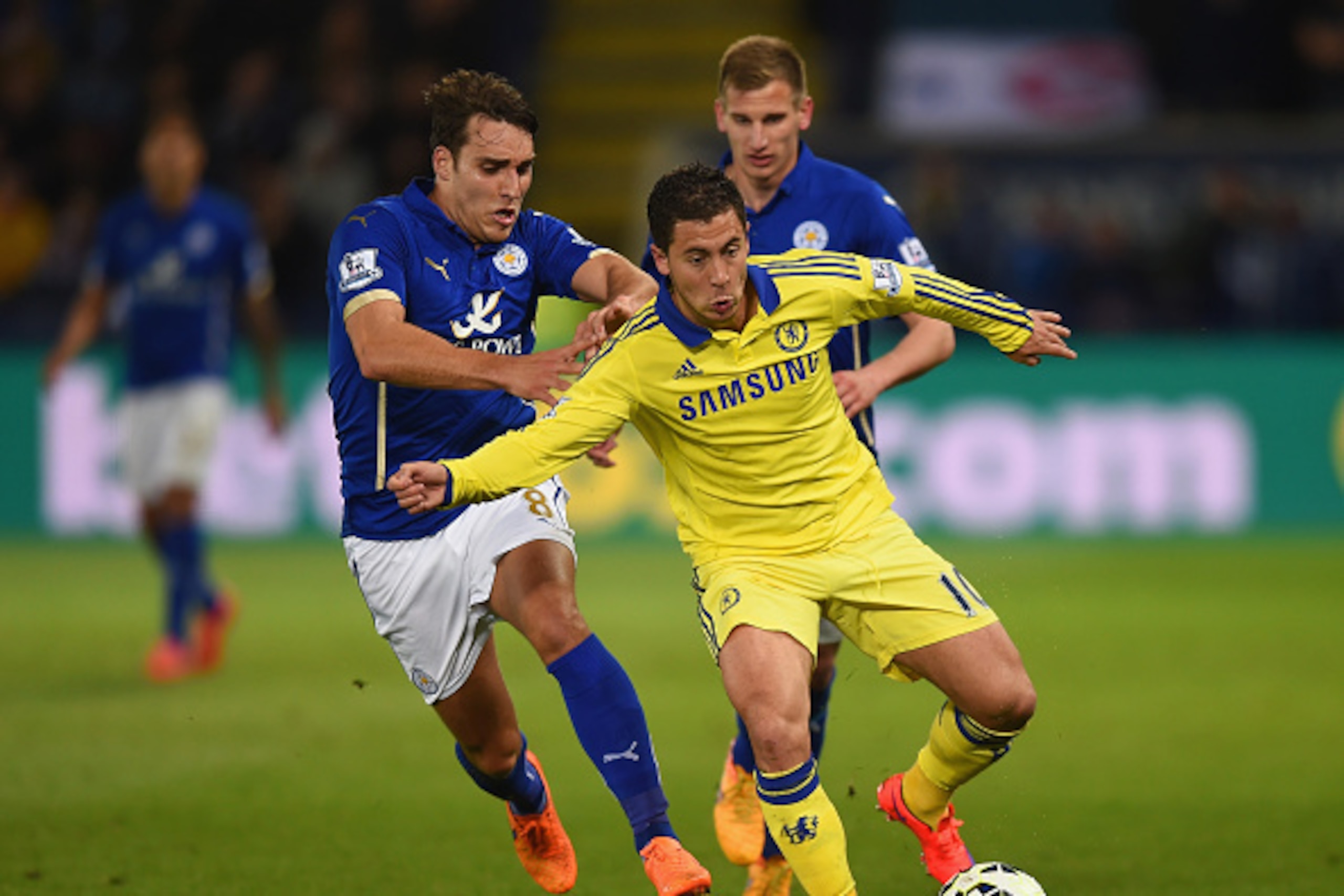 LEICESTER, ENGLAND - APRIL 29: Eden Hazard of Chelsea is closed down by Matthew James of Leicester City  during the Barclays Premier League match between Leicester City and Chelsea at The King Power Stadium on April 29, 2015 in Leicester, England.  (Photo
