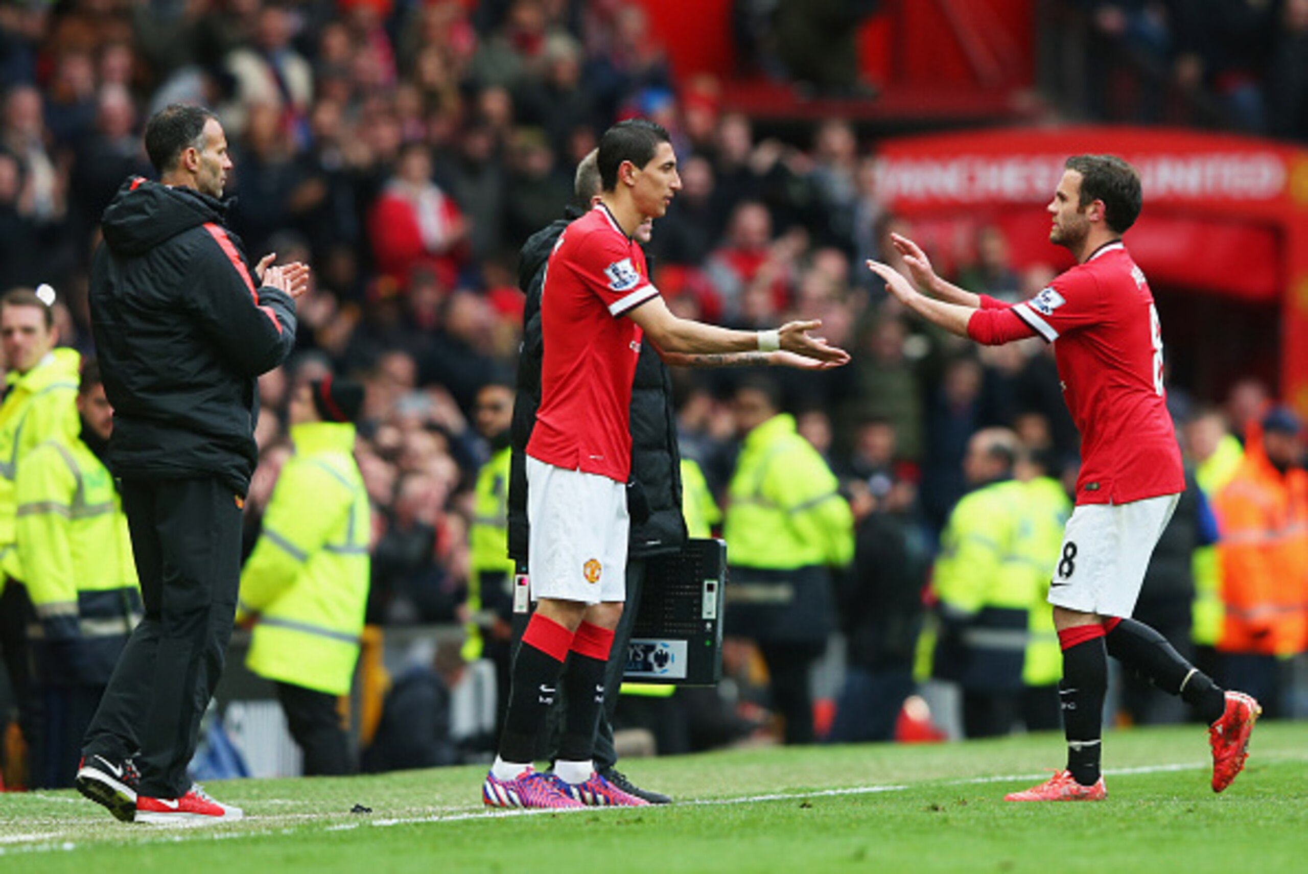 MANCHESTER, ENGLAND - APRIL 12:  Angel di Maria of Manchester United replaces Juan Mata as a substitute during the Barclays Premier League match between Manchester United and Manchester City at Old Trafford on April 12, 2015 in Manchester, England.  (Phot
