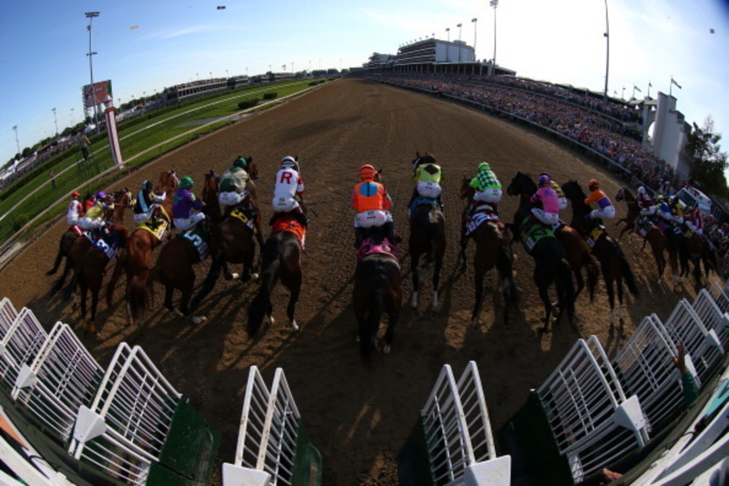 LOUISVILLE, KY - MAY 03:  The field breakes from the starter's gate to start the 140th running of the Kentucky Derby at Churchill Downs on May 3, 2014 in Louisville, Kentucky.  (Photo by Andy Lyons/Getty Images)