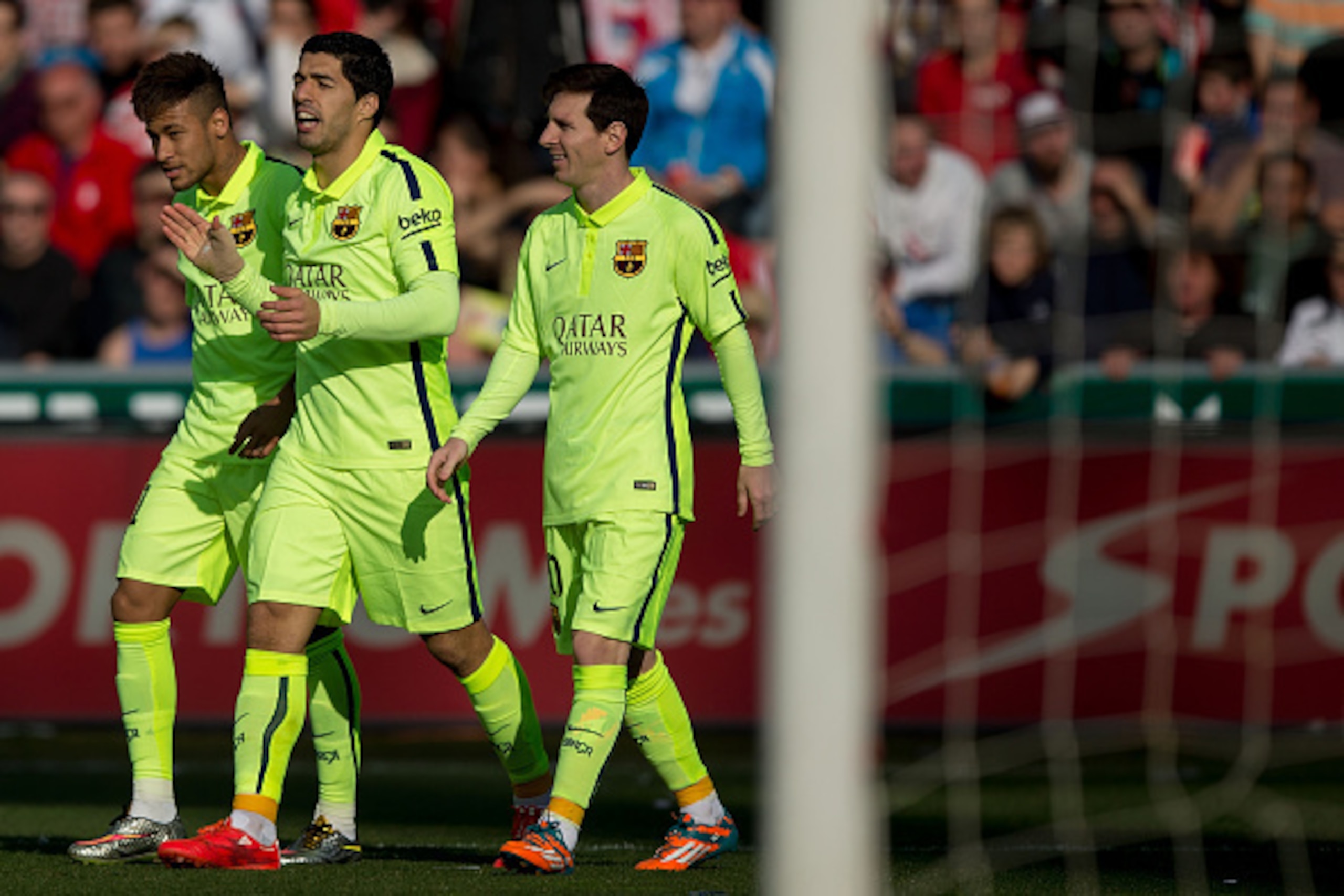 GRANADA, SPAIN - FEBRUARY 28: Luis Suarez (C) celebrates scoring their second goal with team mates Neymar JR. (L) and Lionel Messi (R) during the La Liga match between Granada CF and FC Barcelona at Nuevo Estadio de los Carmenes on February 28, 2015 in Gr GRANADA, SPAIN - FEBRUARY 28: Luis Suarez (C) celebrates scoring their second goal with team mates Neymar JR. (L) and Lionel Messi (R) during the La Liga match between Granada CF and FC Barcelona at Nuevo Estadio de los Carmenes on February 28, 2015 in Gr