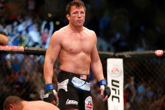 BOSTON, MA - AUGUST 17: Chael Sonnen reacts after winning the fight with a tap out by guillotine choke against Mauricio Rua in their light heavyweight bout at TD Garden on August 17, 2013 in Boston, Massachusetts. (Photo by Jared Wickerham/Getty Images)