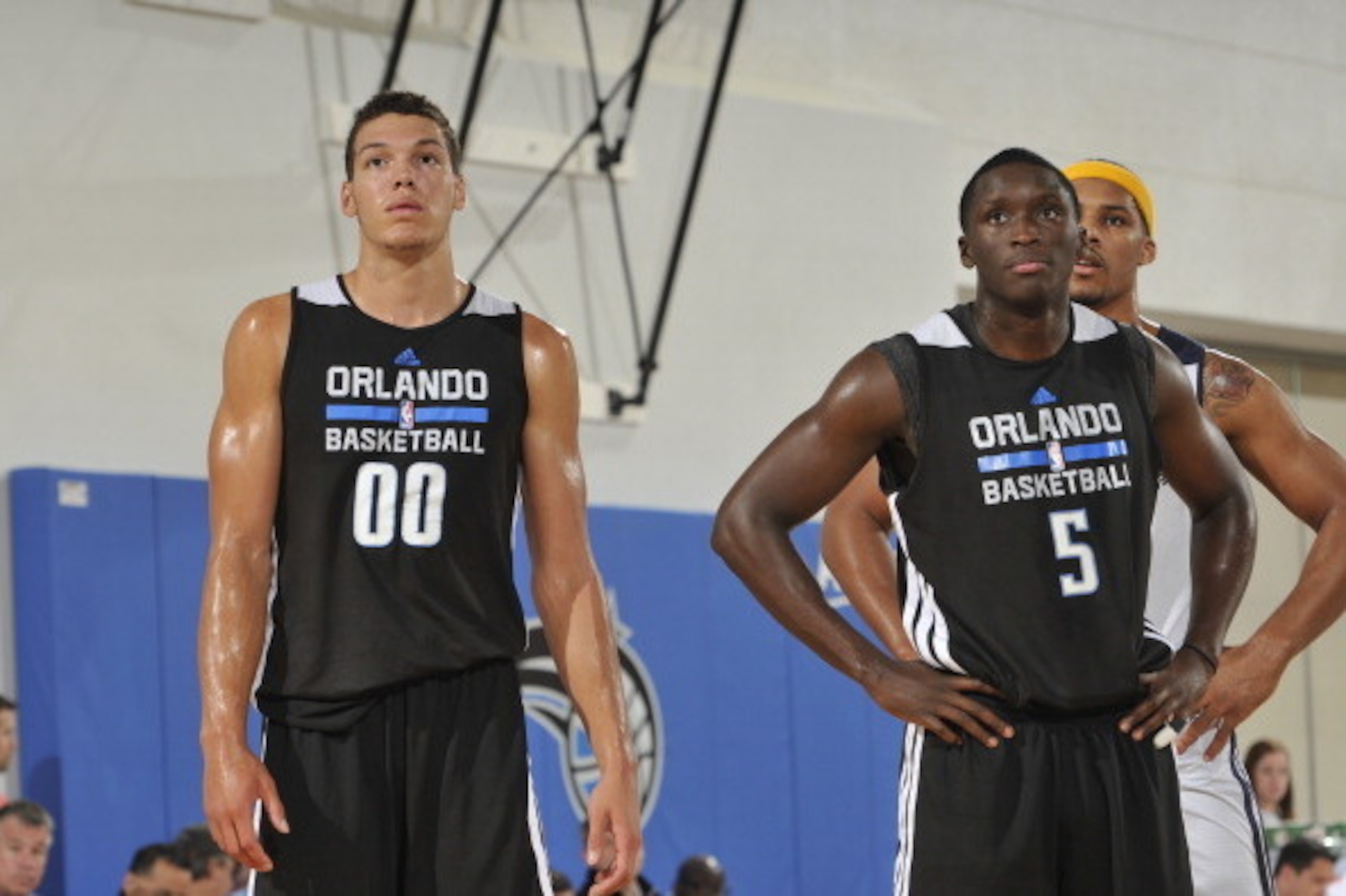 ORLANDO, FL - JULY 8: Aaron Gordon #00 and Victor Oladipo #5 of the Orlando Magic on the court against the Memphis Grizzlies during the game during the Samsung NBA Summer League 2014 on July 8, 2014 at Amway Center in Orlando, Florida. NOTE TO USER: User ORLANDO, FL - JULY 8: Aaron Gordon #00 and Victor Oladipo #5 of the Orlando Magic on the court against the Memphis Grizzlies during the game during the Samsung NBA Summer League 2014 on July 8, 2014 at Amway Center in Orlando, Florida. NOTE TO USER: User