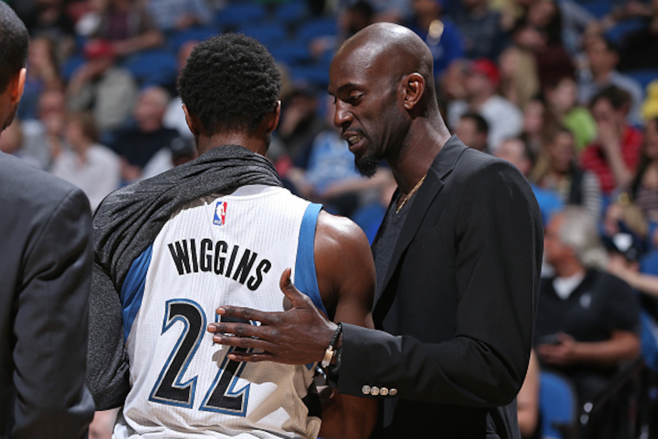 MINNEAPOLIS, MN - APRIL 13:  Kevin Garnett #21 talks with teammate Andrew Wiggins #22 of the Minnesota Timberwolves during the game against the New Orleans Pelicans on April 13, 2015 at Target Center in Minneapolis, Minnesota. NOTE TO USER: User expressly