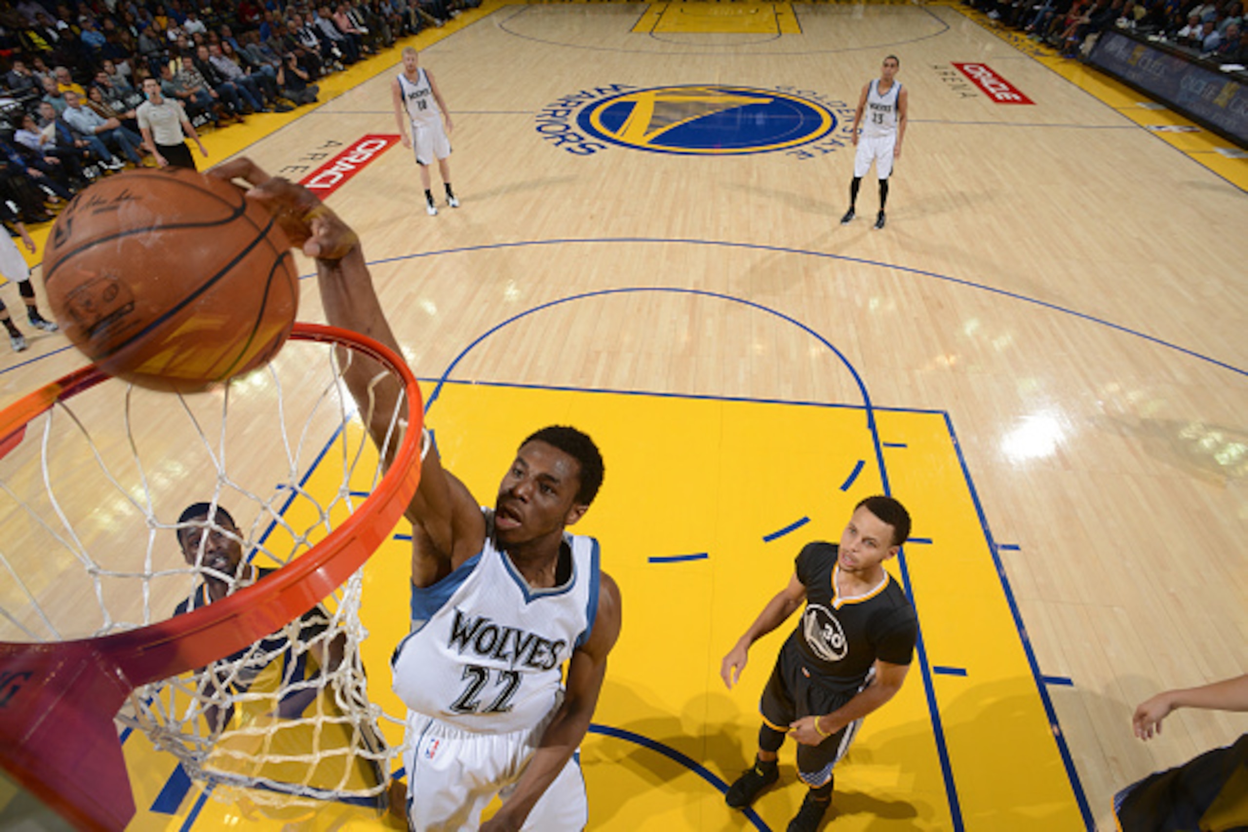 OAKLAND, CA -APRIL 11: Andrew Wiggins #22 of the Minnesota Timberwolves dunks against the Golden State Warriors on April 11, 2015 at Oracle Arena in Oakland, California. NOTE TO USER: User expressly acknowledges and agrees that, by downloading and or usin