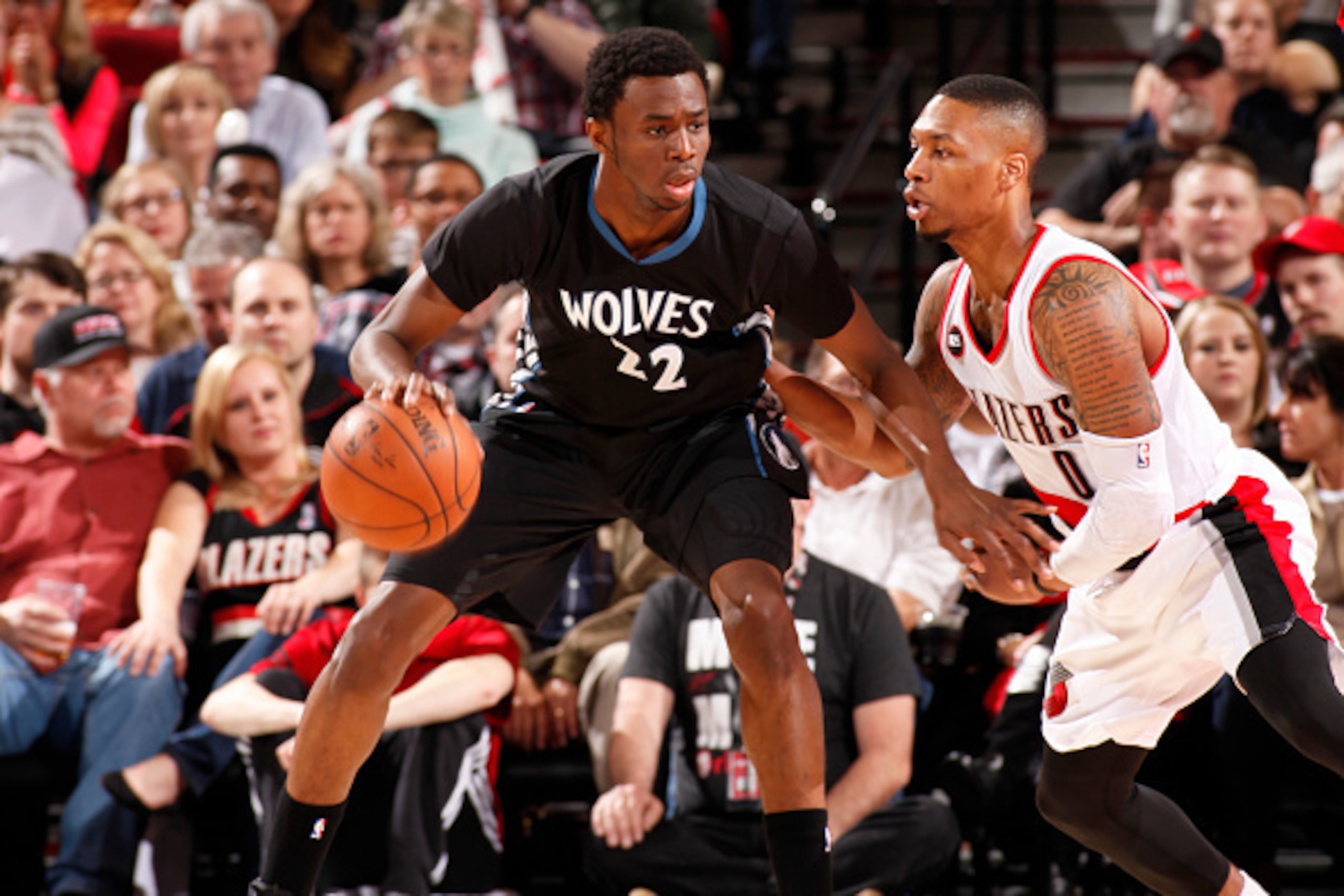 PORTLAND, OR - APRIL 8: Andrew Wiggins #22 of the Minnesota Timberwolves handles the ball against the Portland Trail Blazers on April 8, 2015 at the Moda Center Arena in Portland, Oregon. NOTE TO USER: User expressly acknowledges and agrees that, by downl