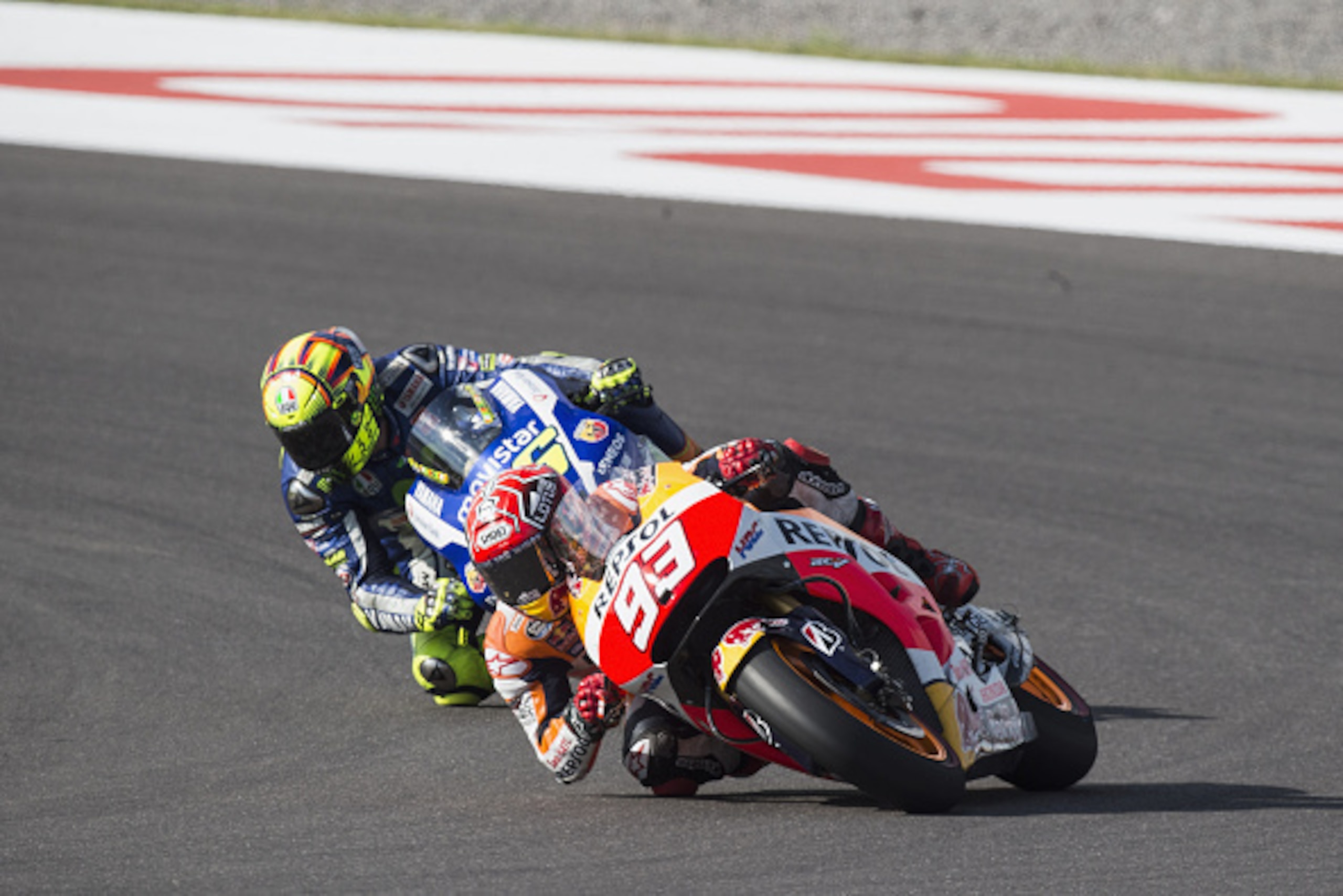 RIO HONDO, ARGENTINA - APRIL 19:  Marc Marquez of Spain and Repsol Honda Team
 leads Valentino Rossi of Italy and Movistar Yamaha MotoGP during the MotoGP race during the MotoGp of Argentina - Race at  on April 19, 2015 in Rio Hondo, Argentina.  (Photo by
