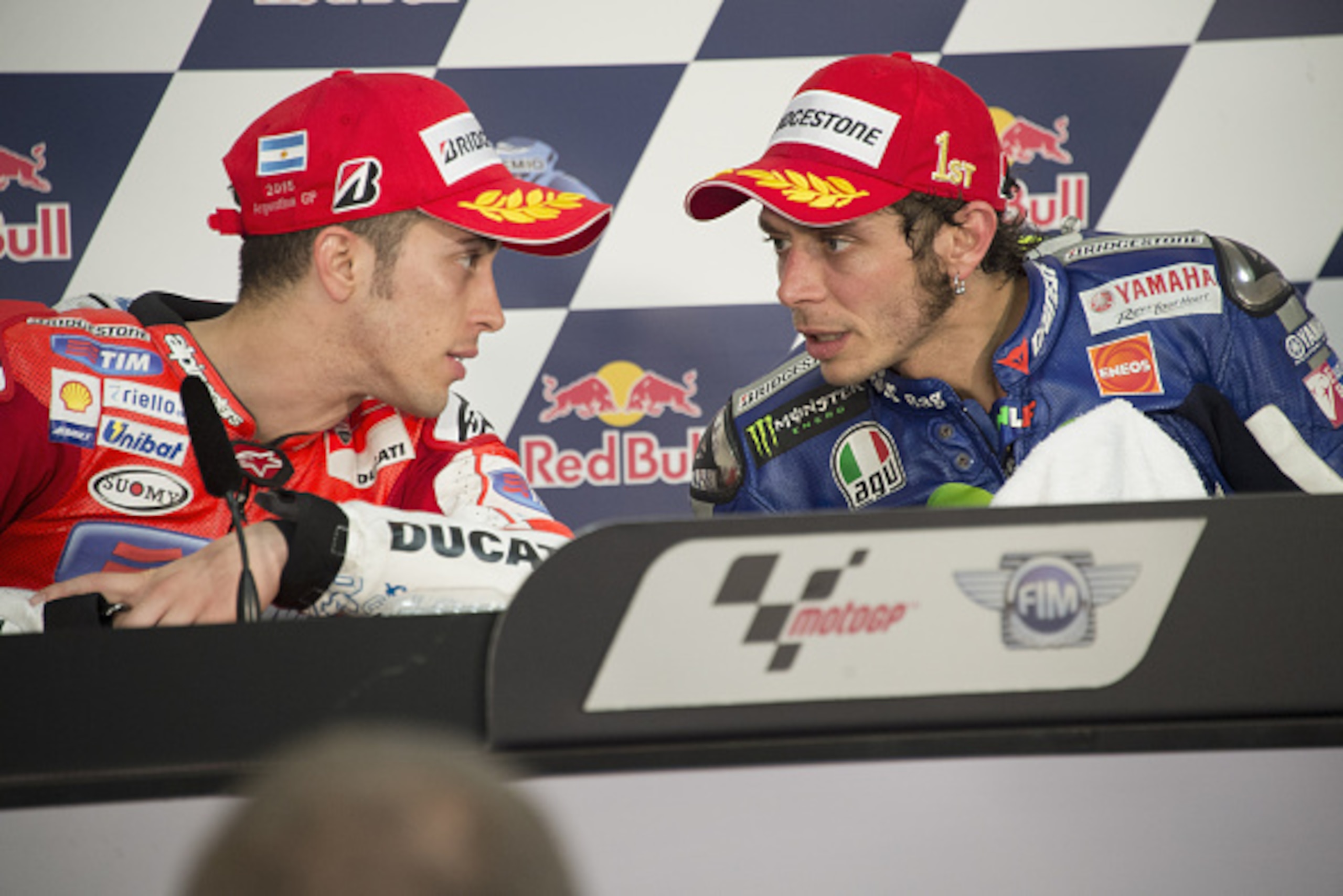 RIO HONDO, ARGENTINA - APRIL 19:  Valentino Rossi of Italy and Movistar Yamaha MotoGP speaks with Andrea Dovizioso of Italy and Ducati Team (L) during the press conference at the end of the MotoGP race during the MotoGp of Argentina - Race at  on April 19
