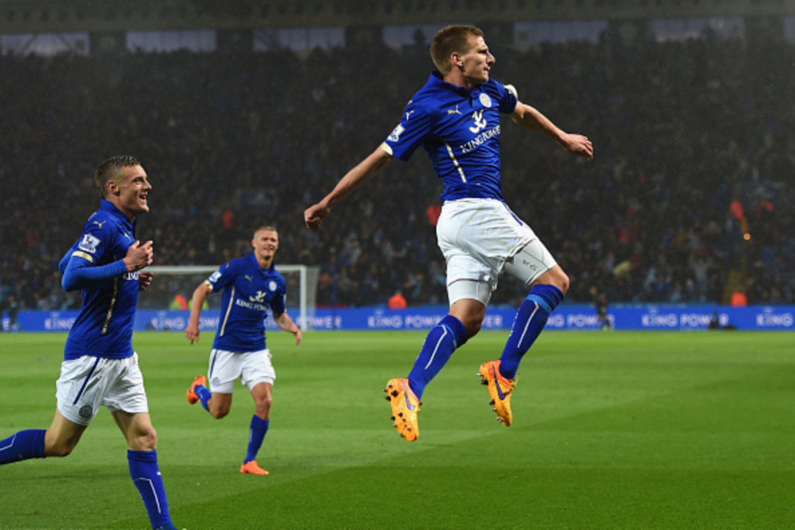 LEICESTER, ENGLAND - APRIL 29:  Marc Albrighton of Leicester City (R) celebrates scoring the opening goal during the Barclays Premier League match between Leicester City and Chelsea at The King Power Stadium on April 29, 2015 in Leicester, England.  (Phot