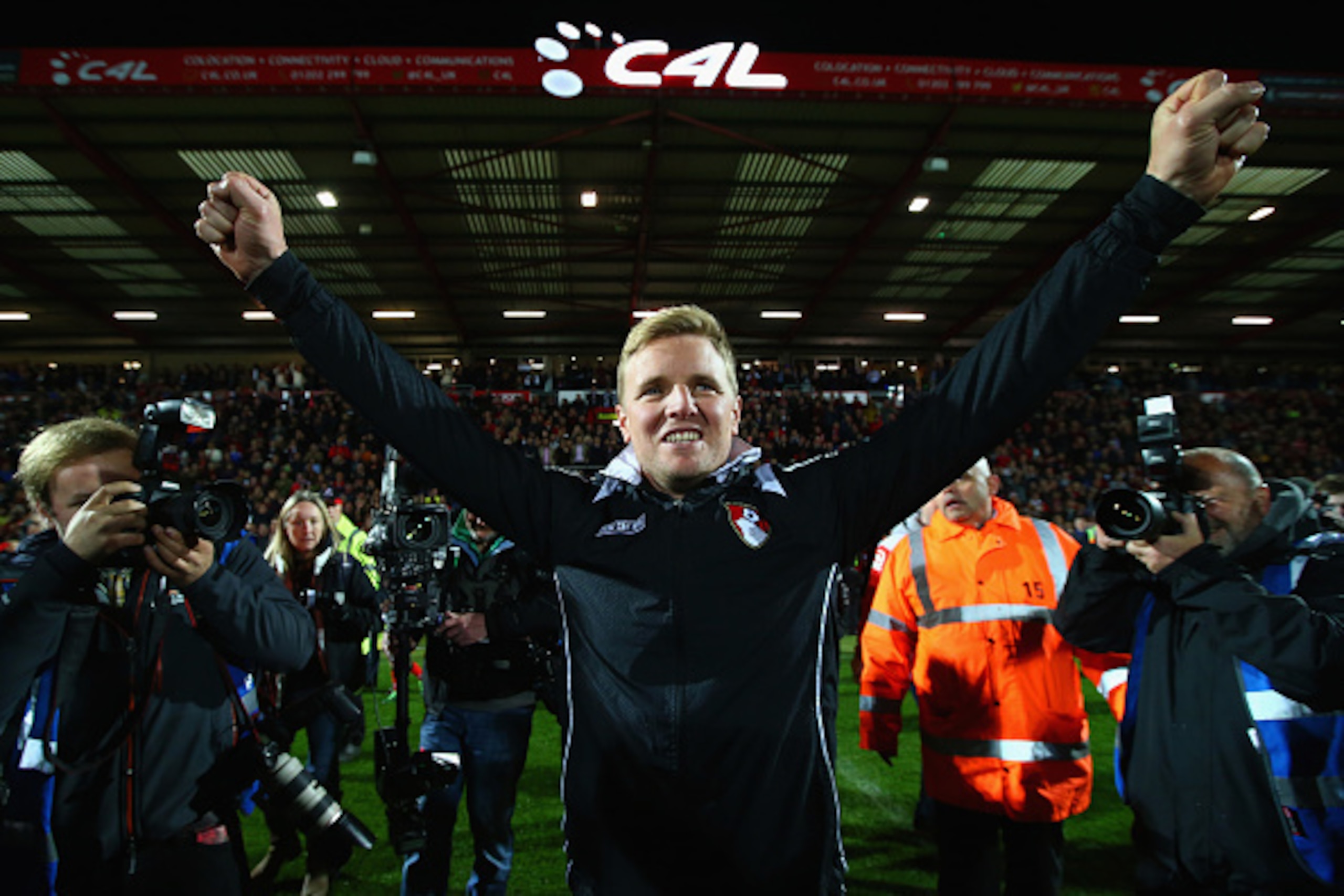 BOURNEMOUTH, ENGLAND - APRIL 27:  Eddie Howe manager of Bournemouth celebrates victory on the pitch after the Sky Bet Championship match between AFC Bournemouth and Bolton Wanderers at Goldsands Stadium on April 27, 2015 in Bournemouth, England. Bournemou