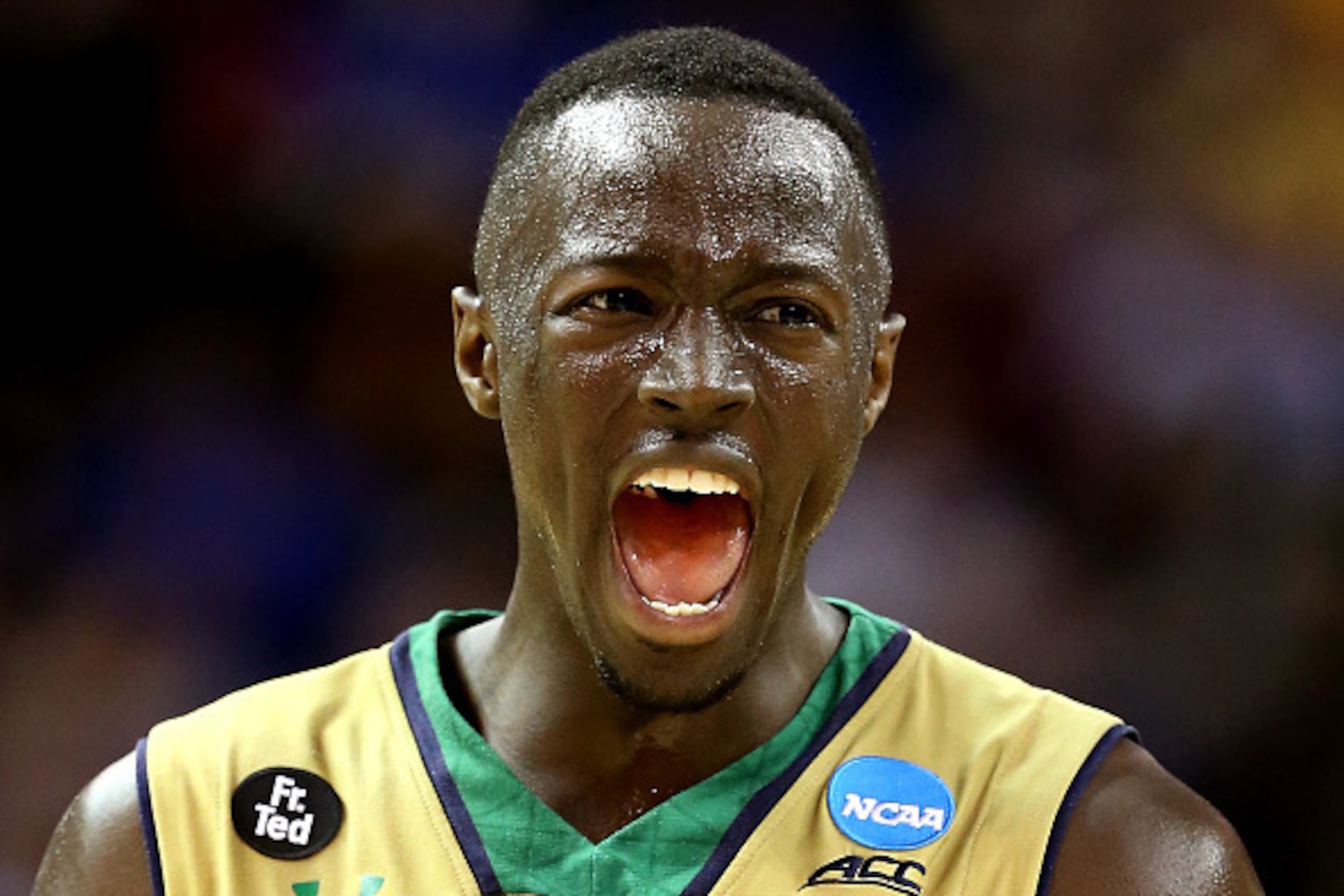 CLEVELAND, OH - MARCH 26:  Jerian Grant #22 of the Notre Dame Fighting Irish celebrates after a play in the second half against the Wichita State Shockers during the Midwest Regional semifinal of the 2015 NCAA Men's Basketball Tournament at Quicken Loans 