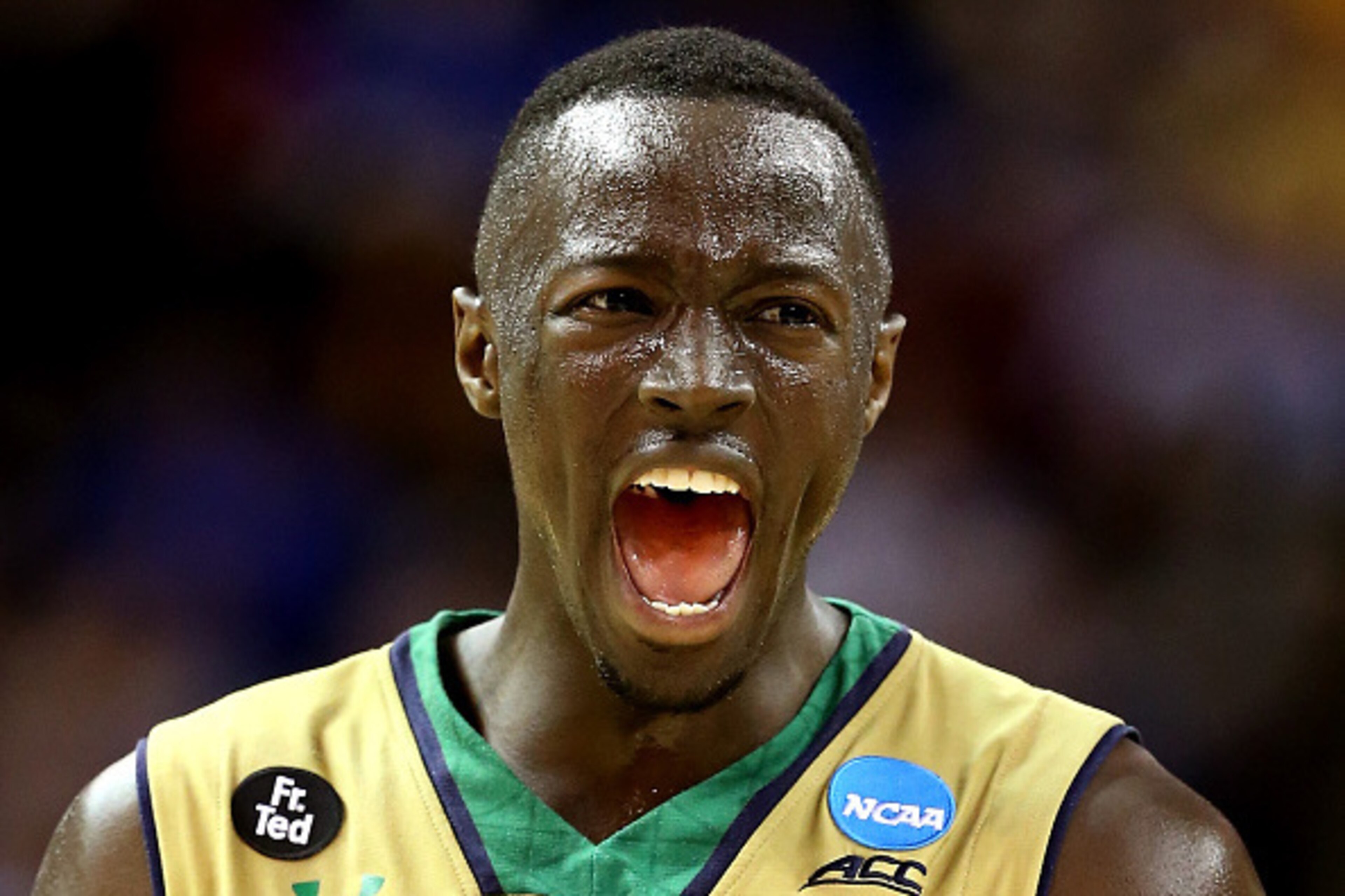 CLEVELAND, OH - MARCH 26:  Jerian Grant #22 of the Notre Dame Fighting Irish celebrates after a play in the second half against the Wichita State Shockers during the Midwest Regional semifinal of the 2015 NCAA Men's Basketball Tournament at Quicken Loans 