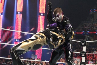 Stardust attacks Goldust.