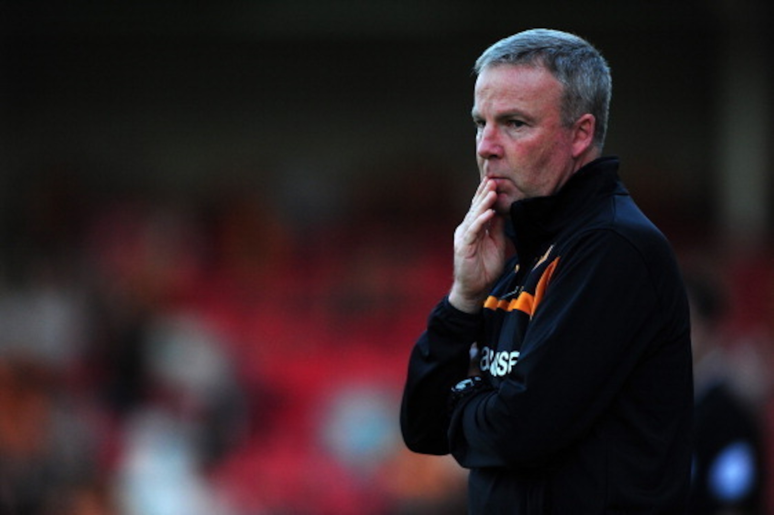 CHELTENHAM, ENGLAND - JULY 11:  Kenny Jackett, Manager of Wolverhampton Wanderers looks on during the Pre-Season Friendly match between Cheltenham Town and Wolverhampton Wanderers at The Abbey Business Stadium on July 11, 2014 in Cheltenham, England.  (Ph