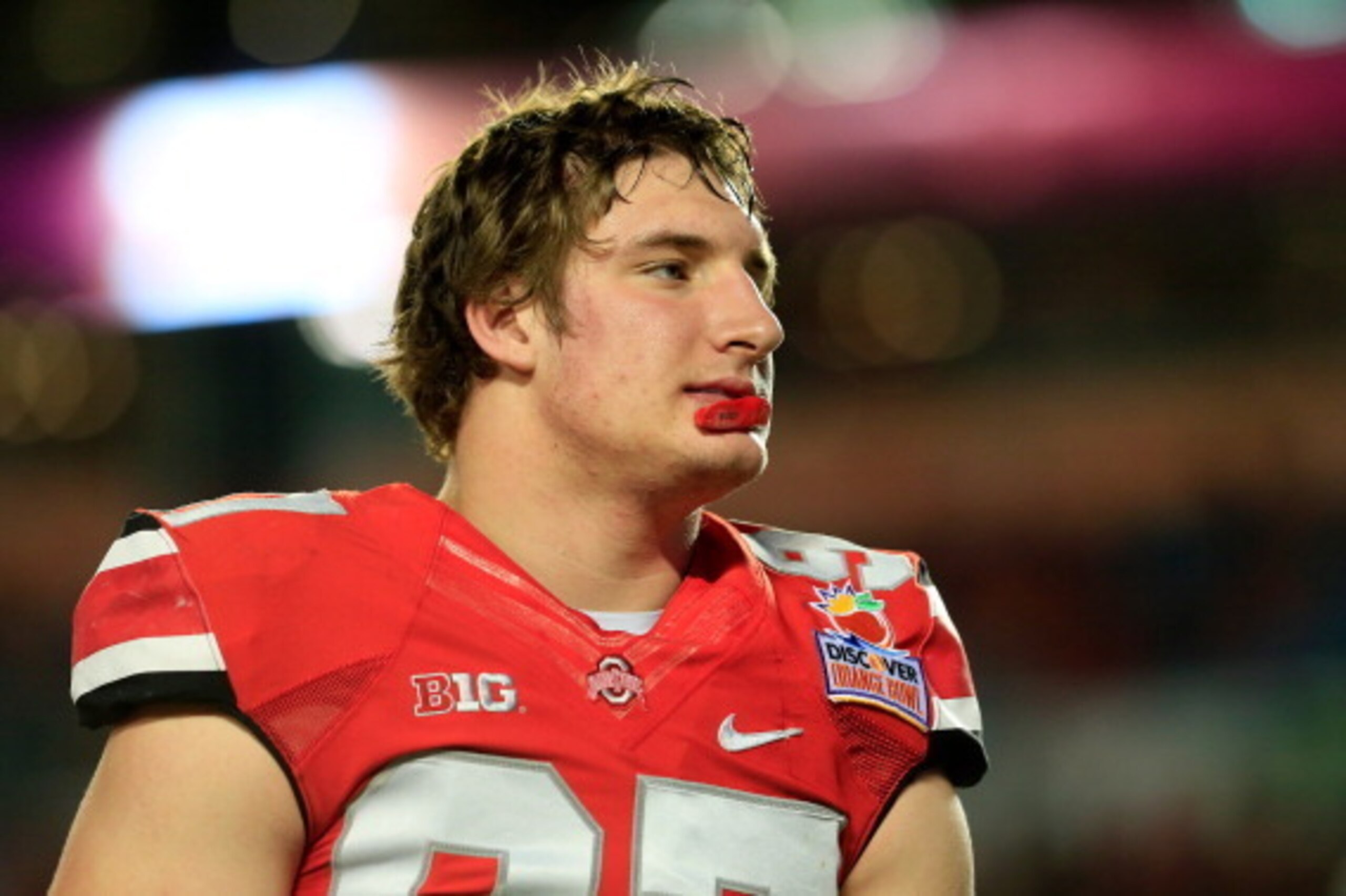 MIAMI GARDENS, FL - JANUARY 03: Joey Bosa #97 of the Ohio State Buckeyes looks on during warm ups prior to the Discover Orange Bowl against the Clemson Tigers at Sun Life Stadium on January 3, 2014 in Miami Gardens, Florida.  (Photo by Chris Trotman/Getty