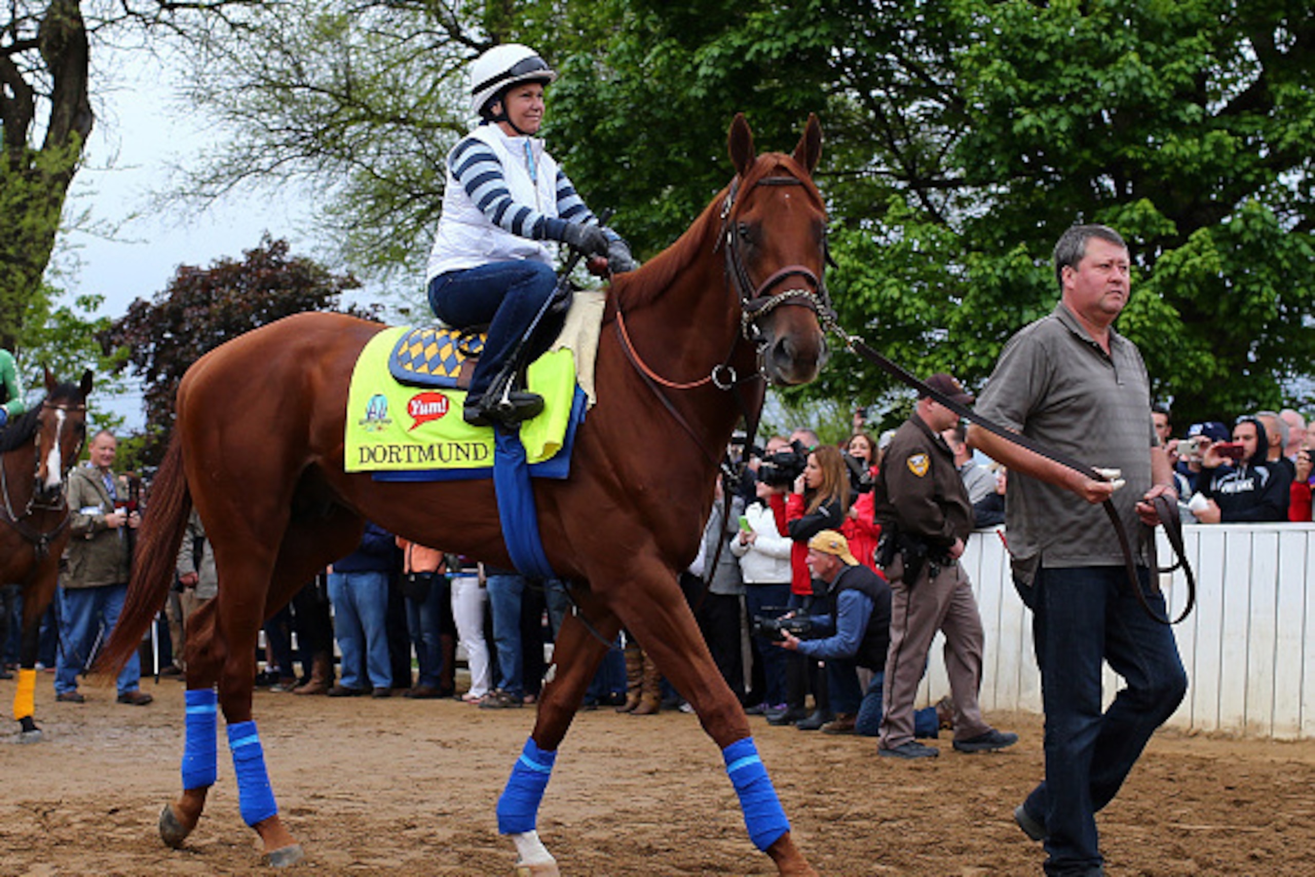 LOUISVILLE, KY - APRIL 30:  Dortmund heads out to the track for morning workouts for the Kentucky Derby at Churchill Downs on April 30, 2015 in Louisville, Kentucky.  (Photo by Elsa/Getty Images)