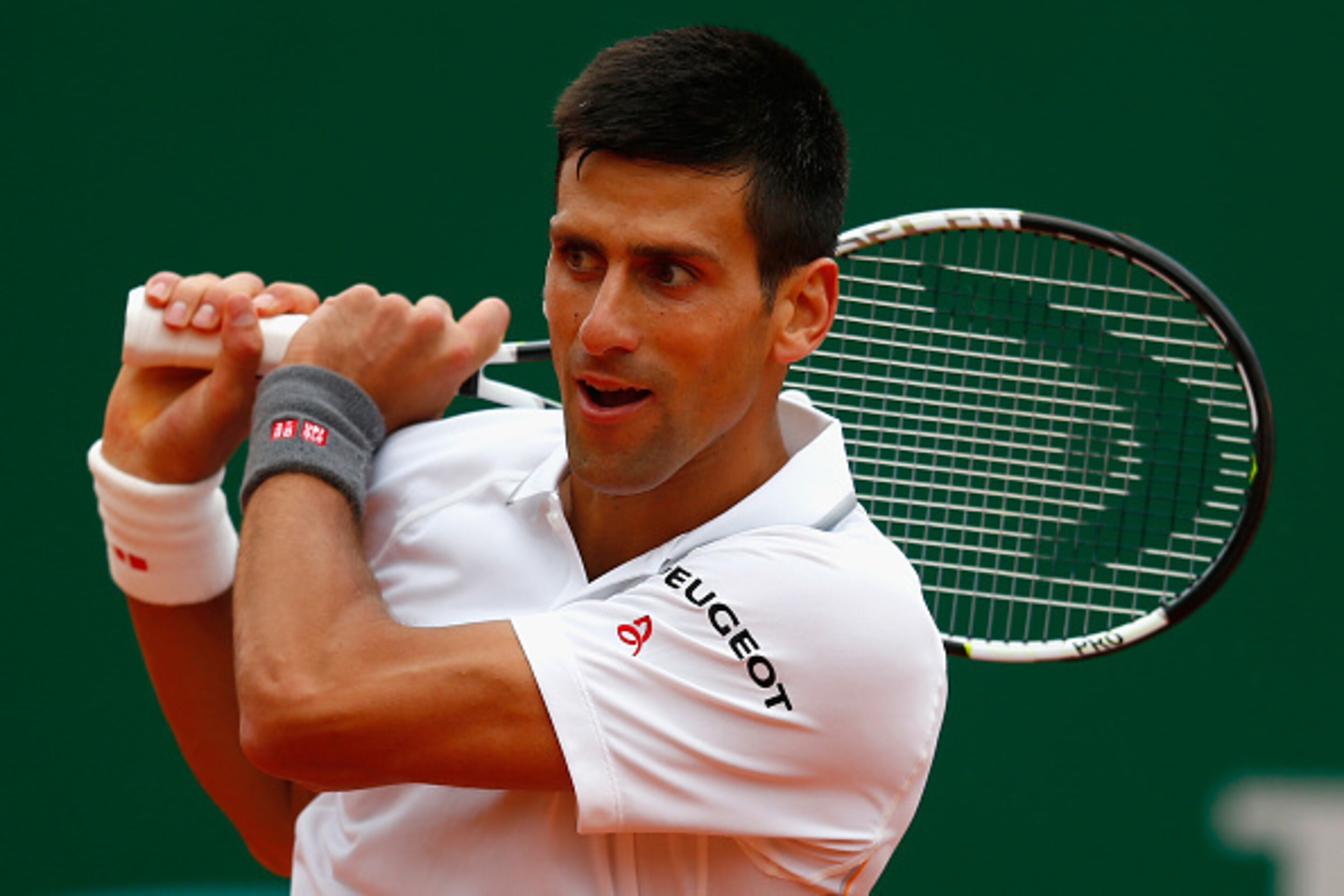 MONTE-CARLO, MONACO - APRIL 16: Novak Djokovic of Serbia in action against Andreas Haider-Maurer of Austria during day five of the Monte Carlo Rolex Masters tennis at the Monte-Carlo Sporting Club on April 16, 2015 in Monte-Carlo, Monaco. (Photo by Juli MONTE-CARLO, MONACO - APRIL 16: Novak Djokovic of Serbia in action against Andreas Haider-Maurer of Austria during day five of the Monte Carlo Rolex Masters tennis at the Monte-Carlo Sporting Club on April 16, 2015 in Monte-Carlo, Monaco. (Photo by Juli
