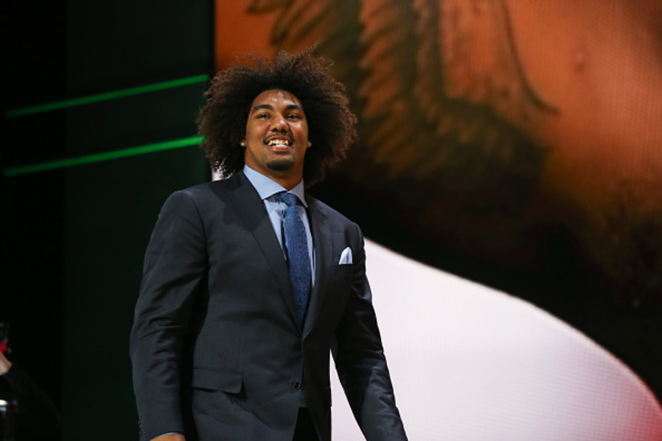CHICAGO, IL - APRIL 30:  Leonard Williams of the USC Trojans walks on stage after being chosen #6 overall by the New York Jets during the first round of the 2015 NFL Draft at the Auditorium Theatre of Roosevelt University on April 30, 2015 in Chicago, Ill
