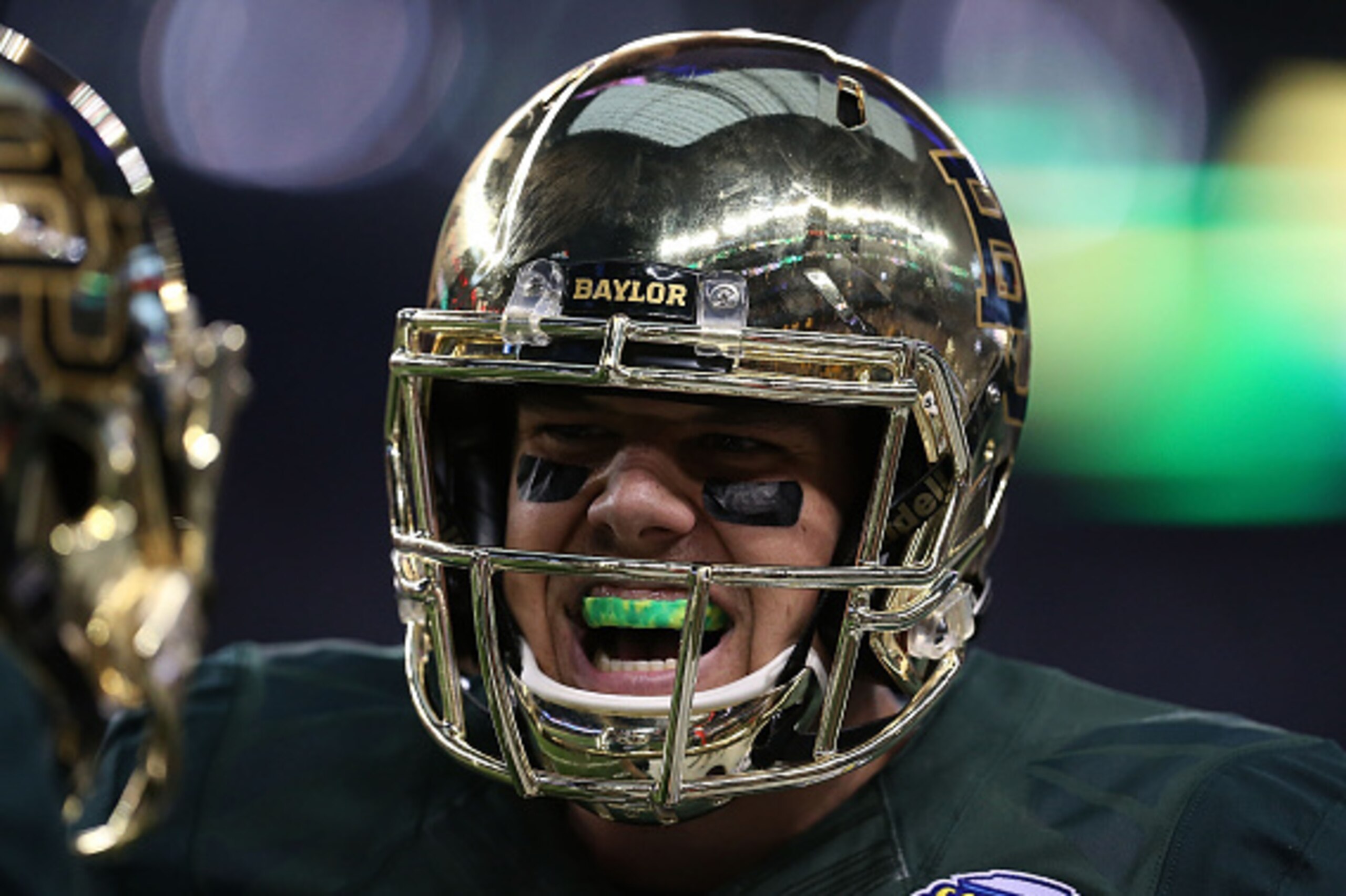 ARLINGTON, TX - JANUARY 01:  Bryce Petty #14 of the Baylor Bears reacts after a Baylor touchdown against the  Michigan State Spartans during the second half of the Goodyear Cotton Bowl Classic at AT&T Stadium on January 1, 2015 in Arlington, Texas.  (Phot