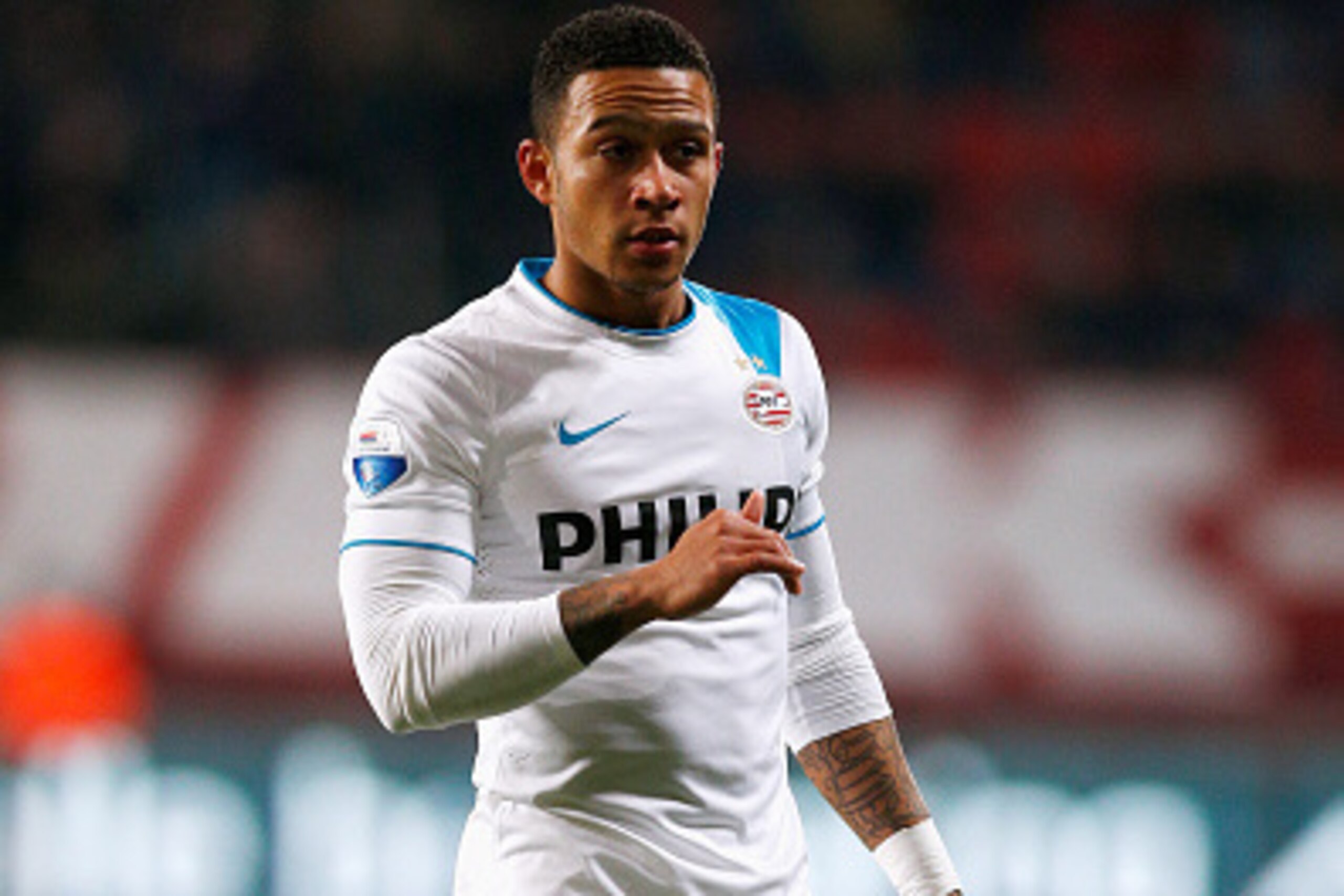 ENSCHEDE, NETHERLANDS - APRIL 04: Memphis Depay of PSV in action during the Dutch Eredivisie match between FC Twente and PSV Eindhoven held at De Grolsch Veste Stadium on April 4, 2015 in Enschede, Netherlands. (Photo by Dean Mouhtaropoulos/Getty Images ENSCHEDE, NETHERLANDS - APRIL 04: Memphis Depay of PSV in action during the Dutch Eredivisie match between FC Twente and PSV Eindhoven held at De Grolsch Veste Stadium on April 4, 2015 in Enschede, Netherlands. (Photo by Dean Mouhtaropoulos/Getty Images