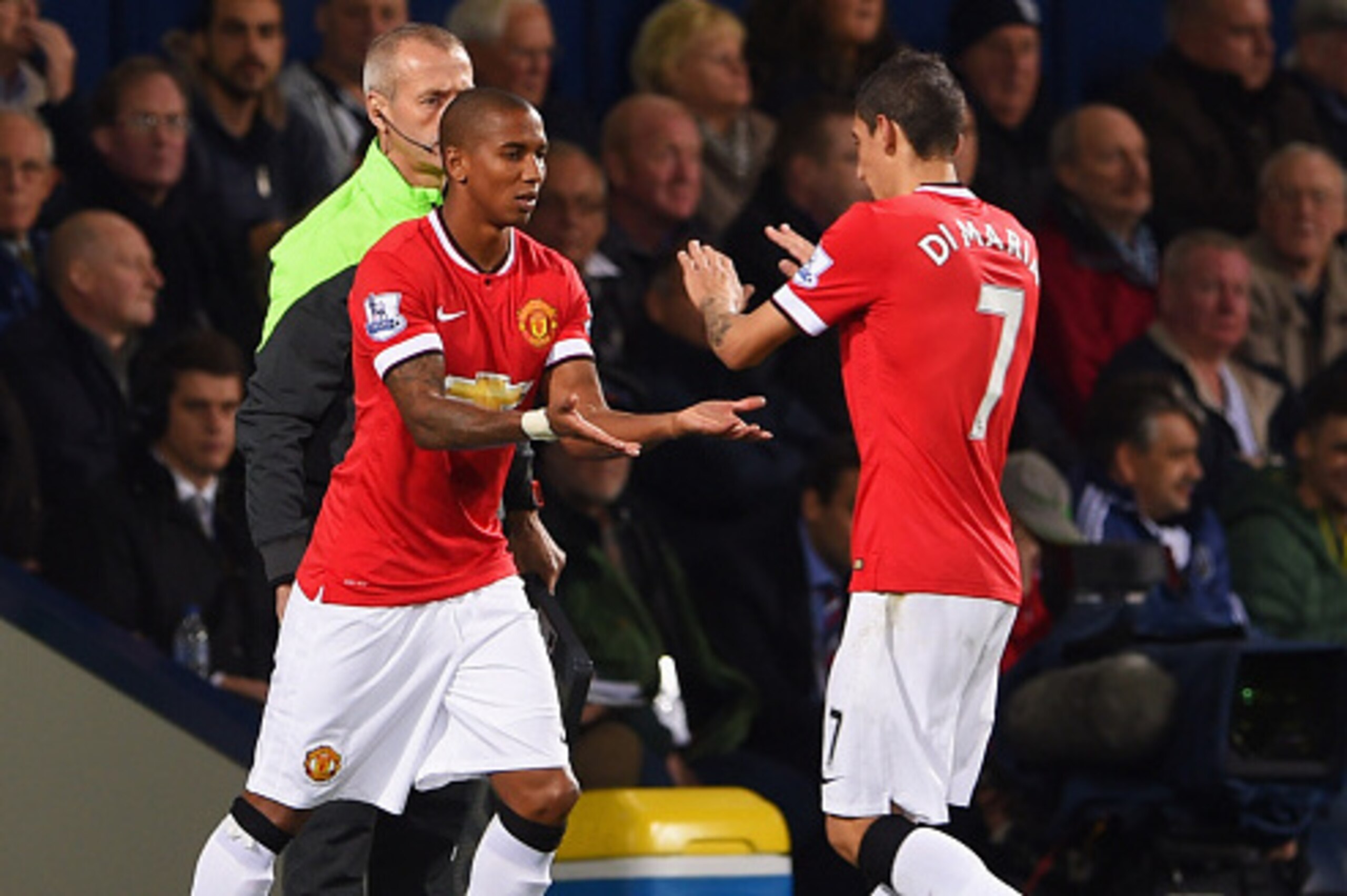 WEST BROMWICH, ENGLAND - OCTOBER 20:  Ashley Young of Manchester United replaces team mate Angel di Maria (R) as a substitute during the Barclays Premier League match between West Bromwich Albion and Manchester United at The Hawthorns on October 20, 2014 