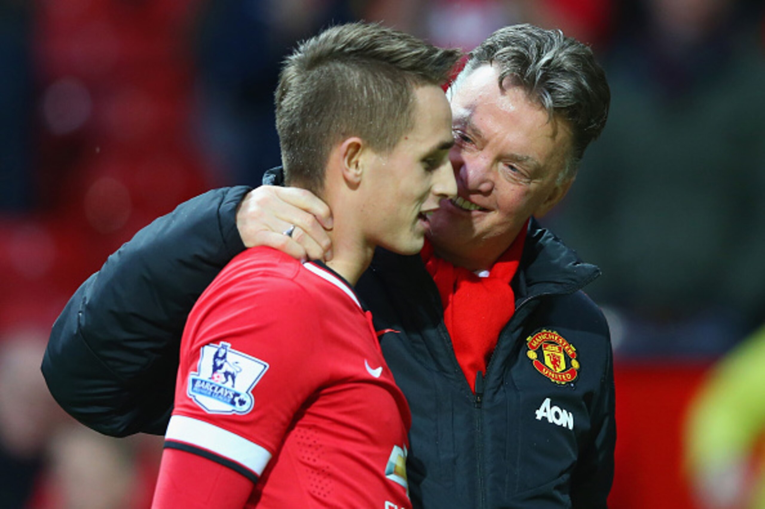 MANCHESTER, ENGLAND - FEBRUARY 28:  Manager Louis van Gaal of Manchester United speaks with Adnan Januzaj of Manchester United after the Barclays Premier League match between Manchester United and Sunderland at Old Trafford on February 28, 2015 in Manches