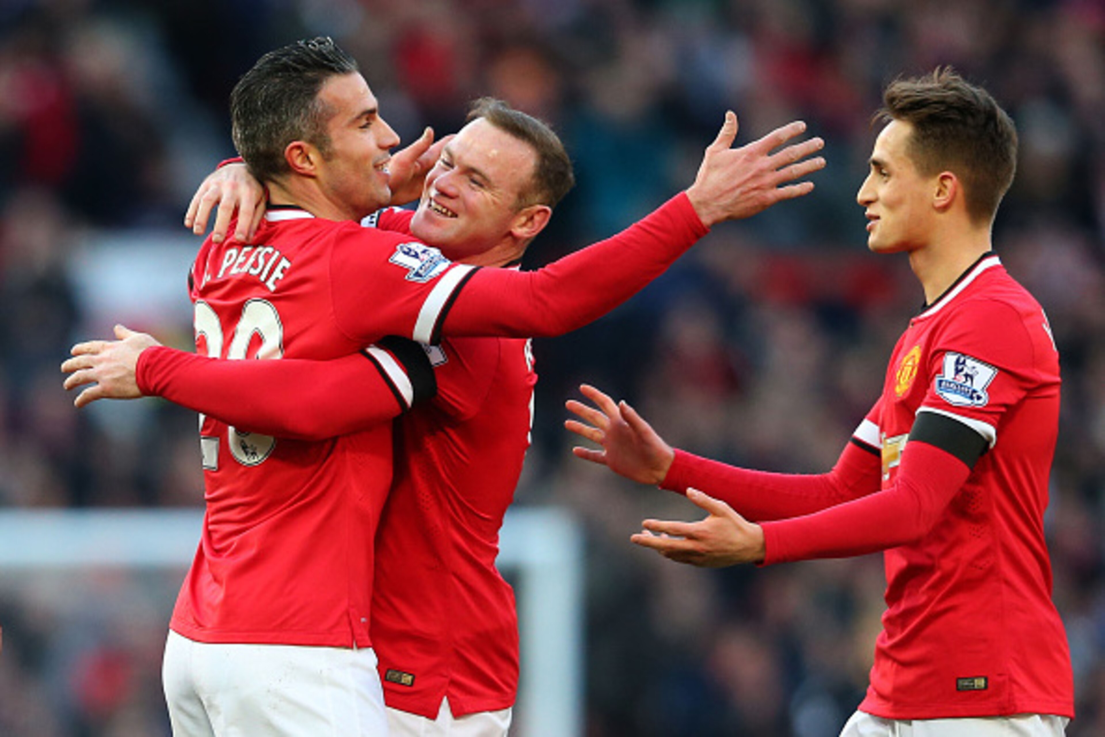 MANCHESTER, ENGLAND - JANUARY 31: (L-R) Robin van Persie of Manchester United is congratulated by teammates Wayne Rooney and Adnan Januzaj after scoring his team's first goal during the Barclays Premier League match between Manchester United and Leiceste MANCHESTER, ENGLAND - JANUARY 31: (L-R) Robin van Persie of Manchester United is congratulated by teammates Wayne Rooney and Adnan Januzaj after scoring his team's first goal during the Barclays Premier League match between Manchester United and Leiceste