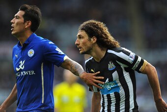 NEWCASTLE UPON TYNE, ENGLAND - OCTOBER 18:  Newcastle player Fabricio Coloccini (r) reacts during the Barclays Premier League match between Newcastle United and Leicester City at St James' Park on October 18, 2014 in Newcastle upon Tyne, England.  (Photo 