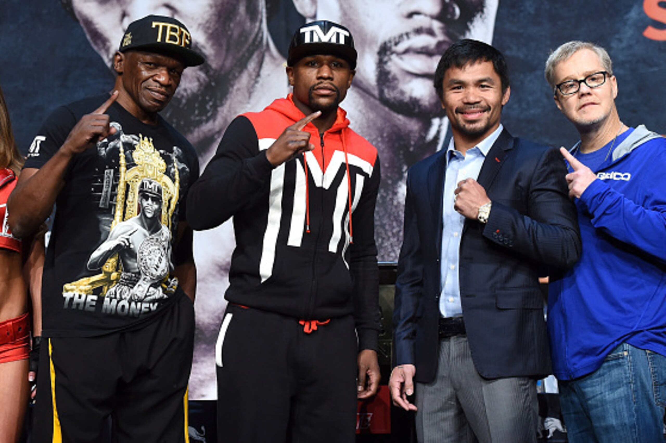 LAS VEGAS, NV - APRIL 29:  (L-R) Trainer Floyd Mayweather Sr., WBC/WBA welterweight champion Floyd Mayweather Jr., WBO welterweight champion Manny Pacquiao and trainer Freddie Roach pose during a news conference at the KA Theatre at MGM Grand Hotel & Casi