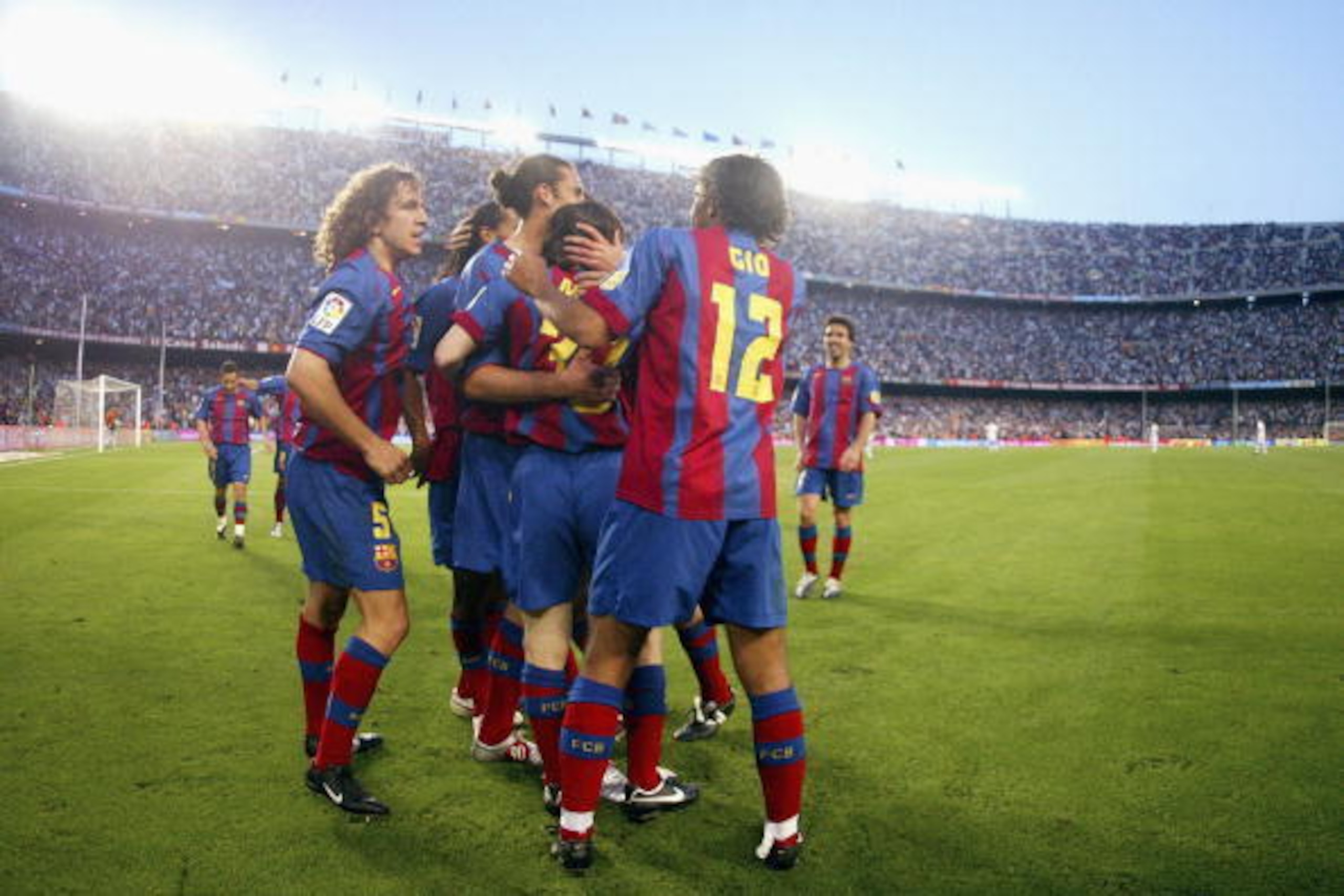 BARCELONA, SPAIN - MAY 1:  FC Barcelona players celebrate Leo Messi's goal during the La Liga match between FC Barcelona and Albacete on May 1, 2005 at Camp Nou stadium in Barcelona, Spain. (Photo by Luis Bagu/Getty Images)