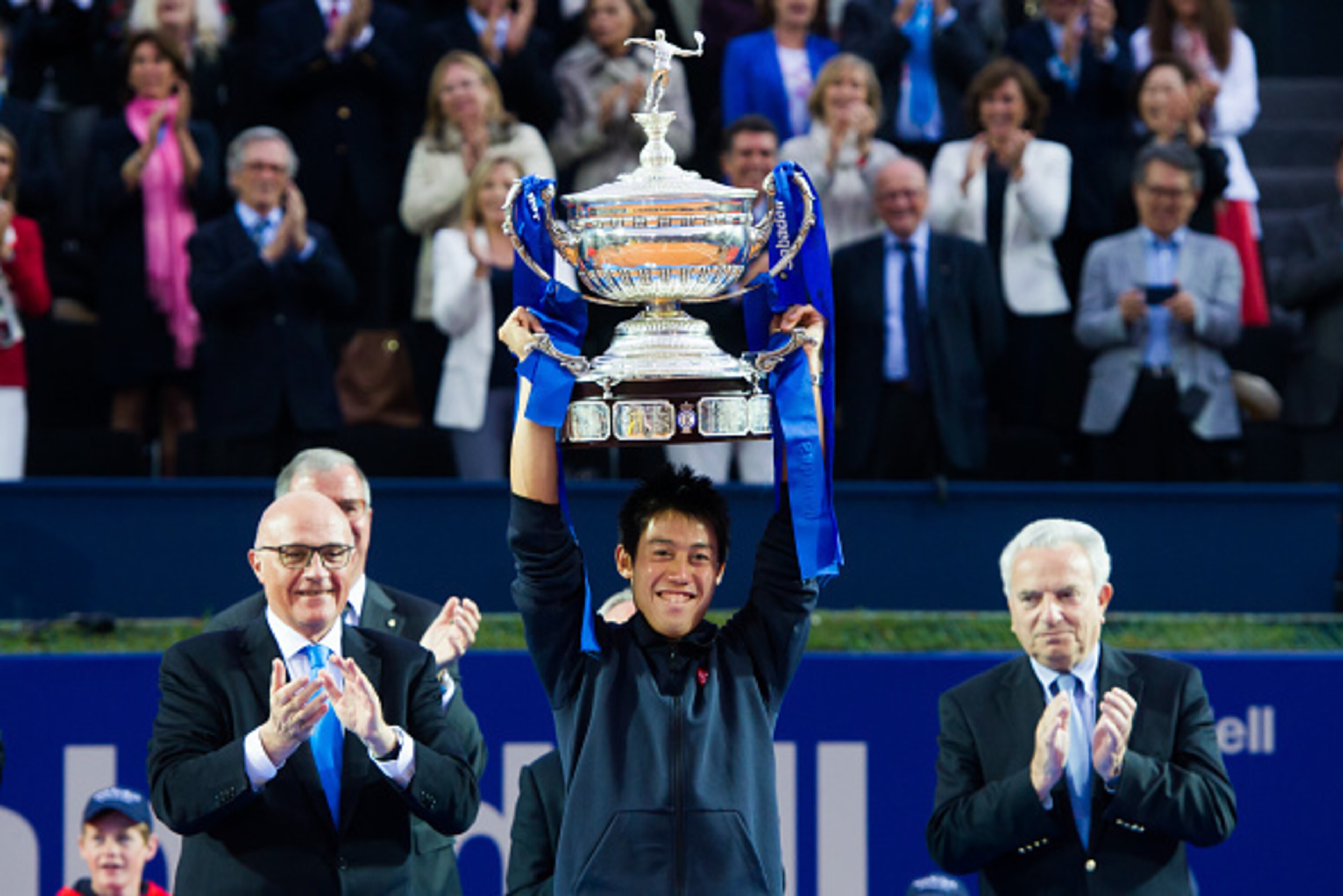 BARCELONA, SPAIN - APRIL 26:  Kei Nishikori of Japan holds the trophy of the Barcelona Open Banc Sabadell after defeating Pablo Andujar of Spain on the final match during day seven of the Barcelona Open Banc Sabadell at the Real Club de Tenis Barcelona on