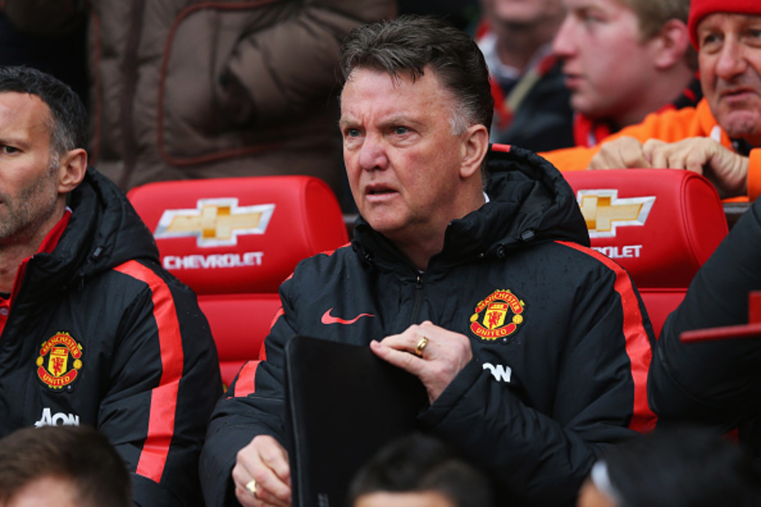 MANCHESTER, ENGLAND - APRIL 12:  Louis van Gaal manager of Manchester United looks on from the bench prior to the Barclays Premier League match between Manchester United and Manchester City at Old Trafford on April 12, 2015 in Manchester, England.  (Photo