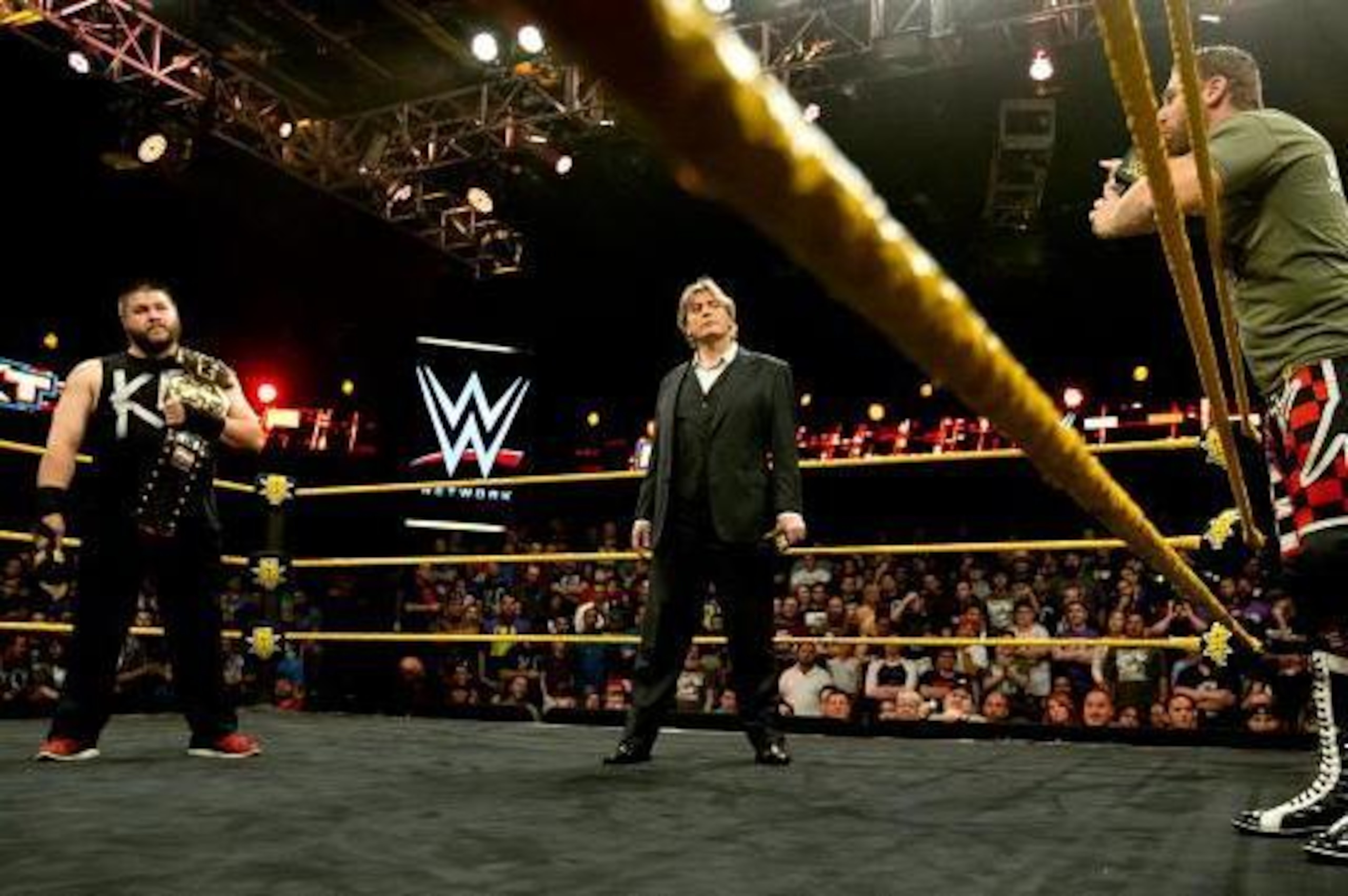 Kevin Owens listens to Sami Zayn's challenge. Kevin Owens listens to Sami Zayn's challenge.