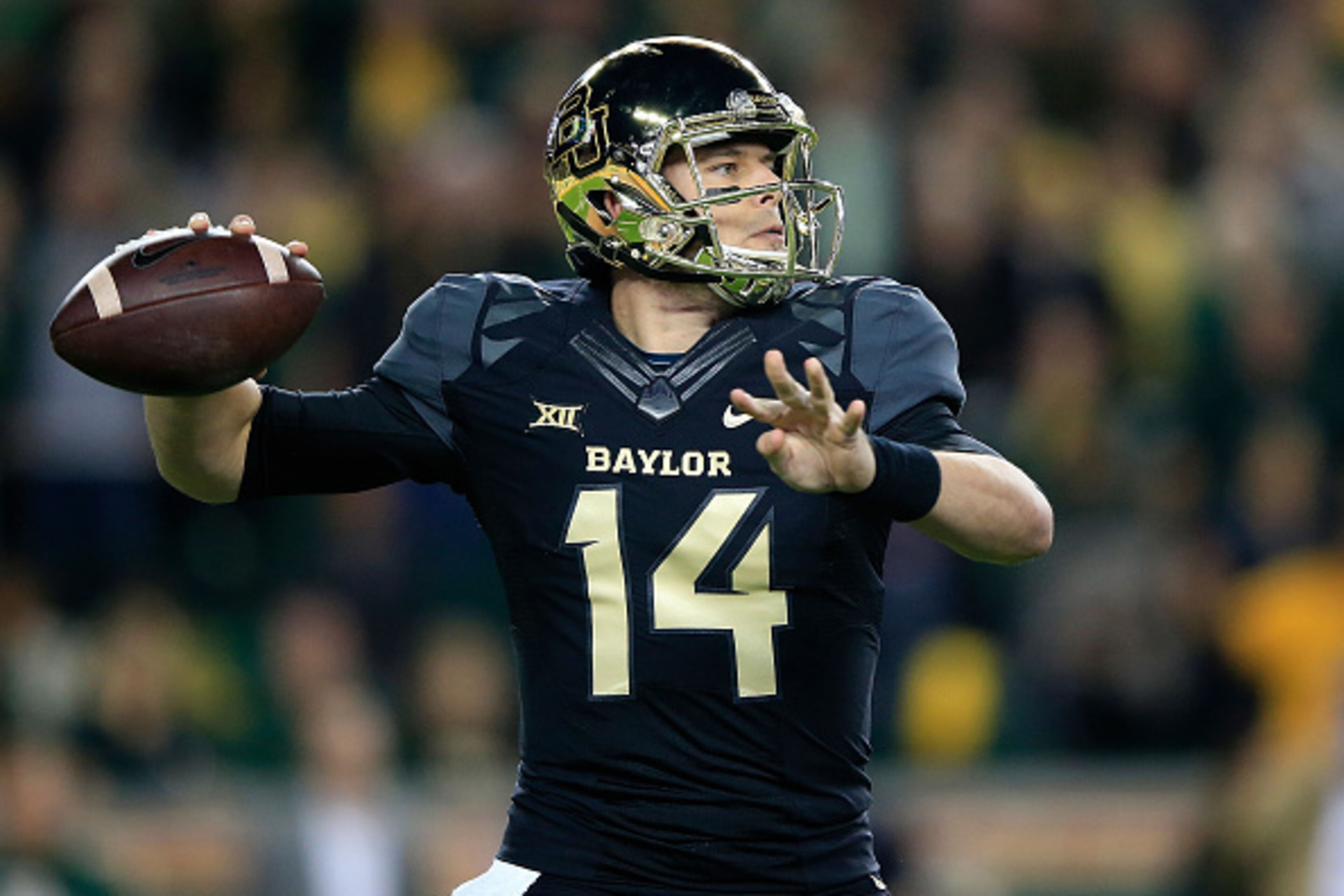 WACO, TX - DECEMBER 06: Bryce Petty #14 of the Baylor Bears passes against the Kansas State Wildcats during the first half of the game on December 6, 2014 at McLane Stadium in Waco, Texas. (Photo by Jamie Squire/Getty Images) WACO, TX - DECEMBER 06: Bryce Petty #14 of the Baylor Bears passes against the Kansas State Wildcats during the first half of the game on December 6, 2014 at McLane Stadium in Waco, Texas. (Photo by Jamie Squire/Getty Images)