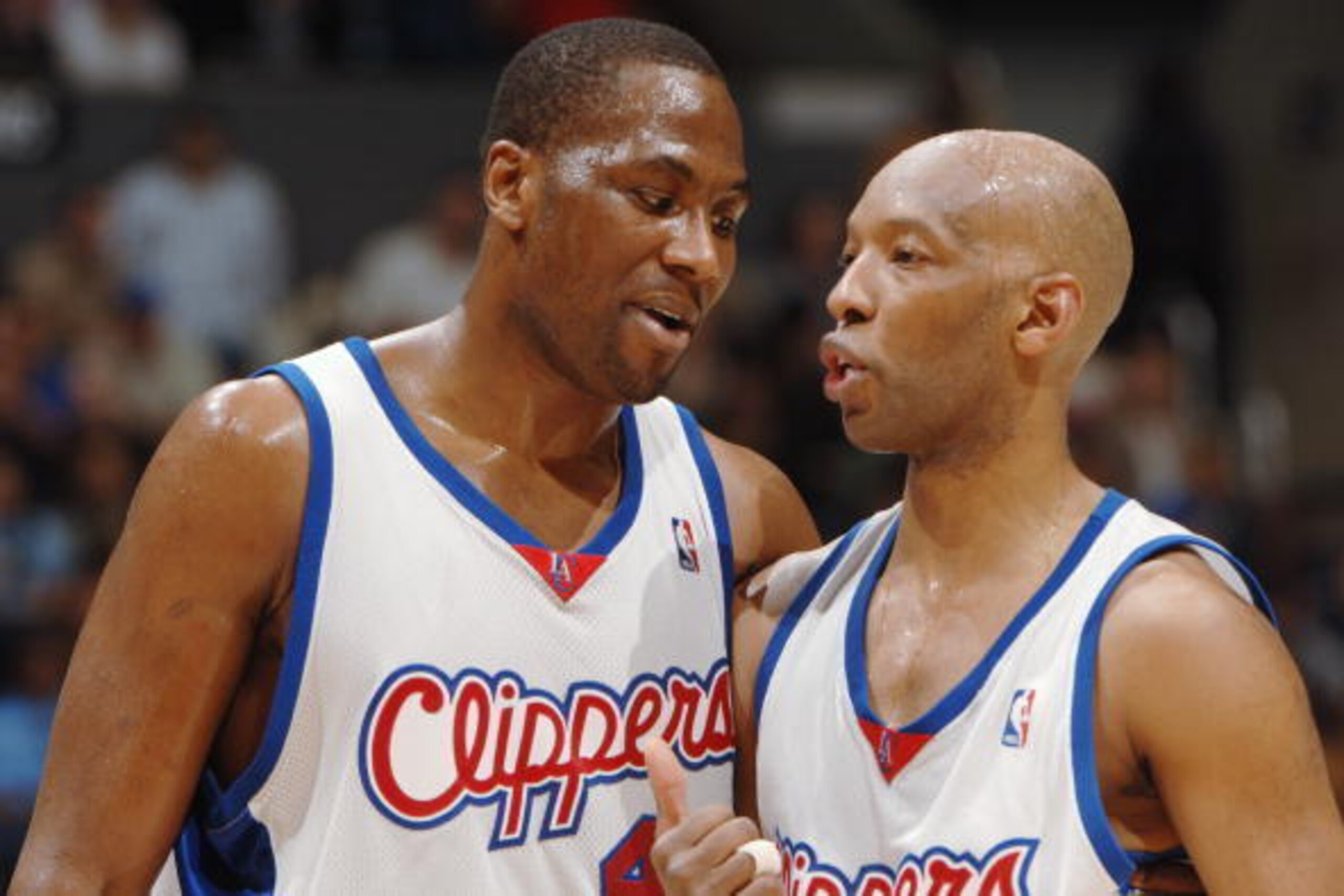 LOS ANGELES - APRIL 4:  Sam Cassell #19 and Elton Brand #42 of the Los Angeles Clippers talk during the game with the Denver Nuggets on April 4, 2006 at Staples Center in Los Angeles, California.  The Clippers won 111-109. NOTE TO USER: User expressly ack