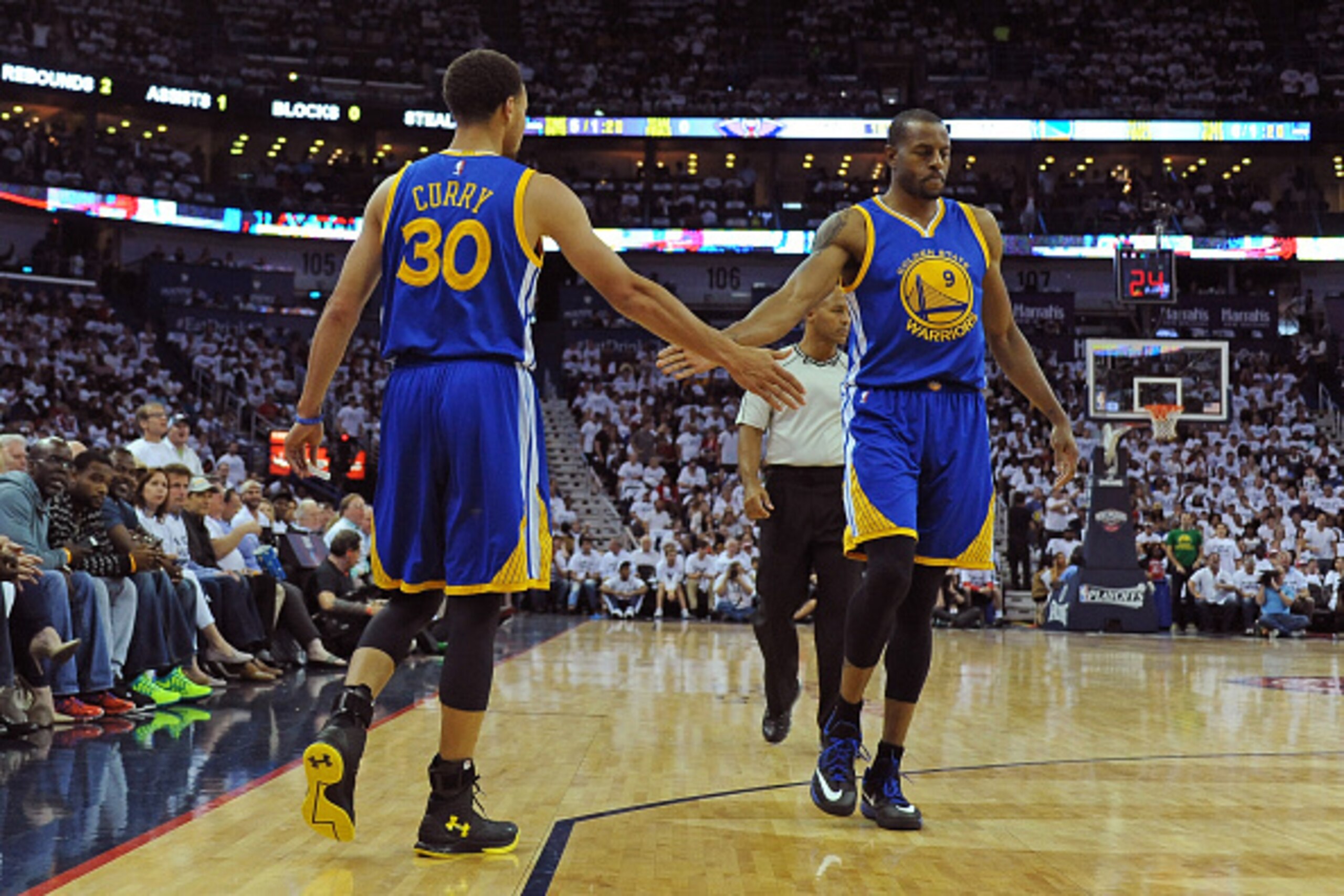 NEW ORLEANS, LA - APRIL 25:  Stephen Curry #30 and Andre Iguodala #9 of the Golden State Warriors high five against the New Orleans Pelicans in Game Four of the Western Conference Quarterfinals during the NBA Playoffs at Smoothie King Center on April 25, 
