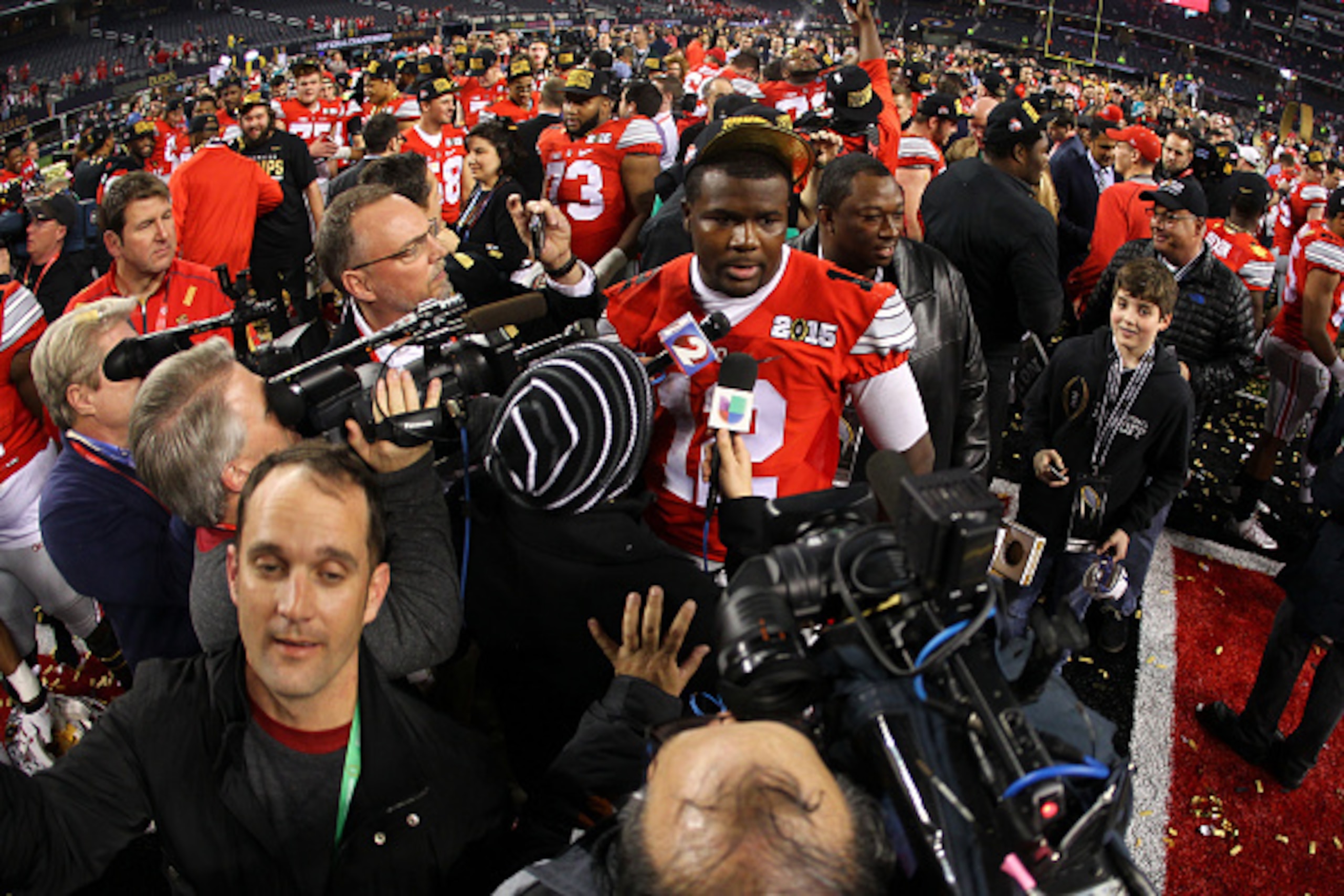 ARLINGTON, TX - JANUARY 12:  Quarterback Cardale Jones #12 of the Ohio State Buckeyes celebrates after defeating the Oregon Ducks 42 to 20 in the College Football Playoff National Championship Game at AT&T Stadium on January 12, 2015 in Arlington, Texas. 