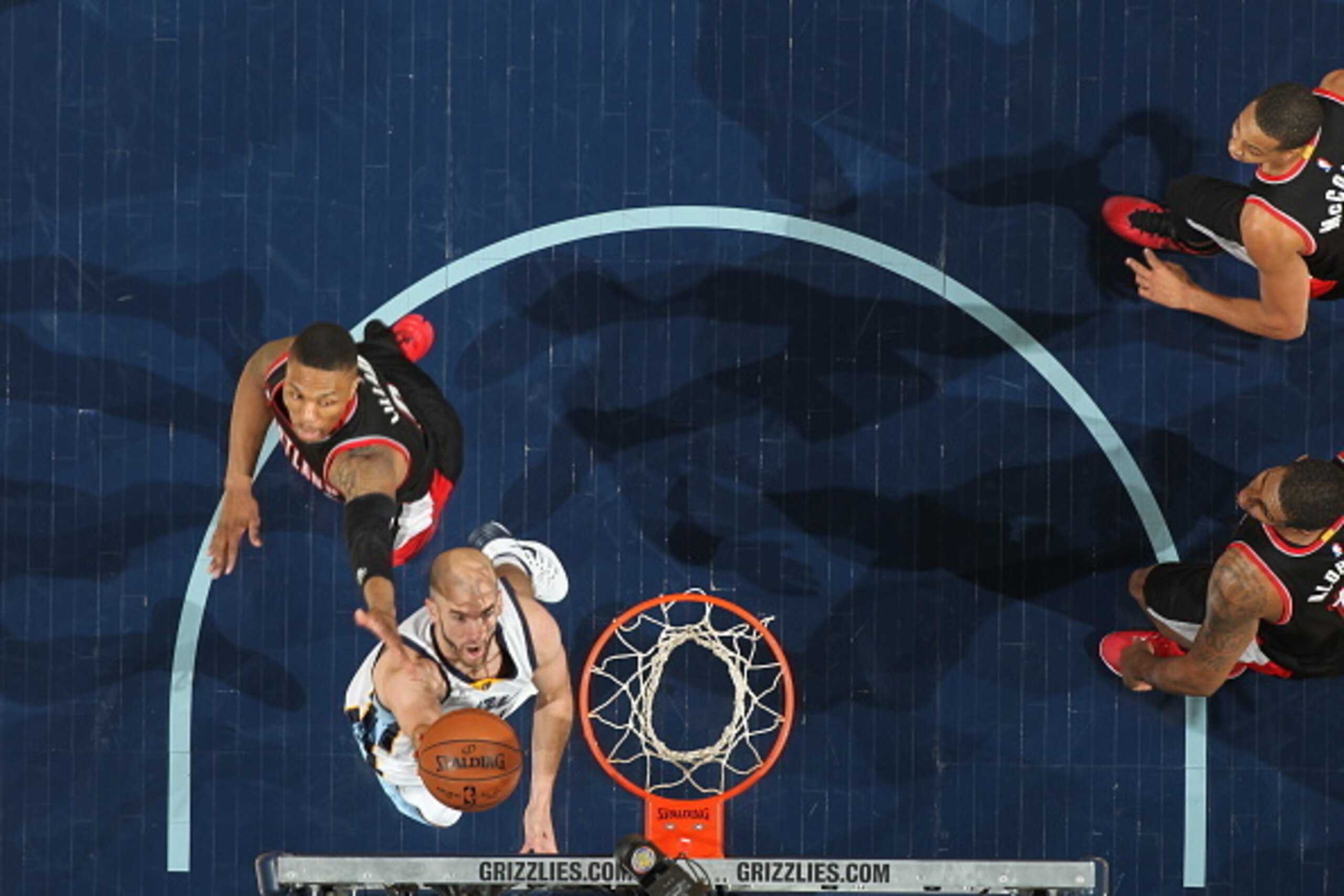 MEMPHIS, TN - APRIL 29:  Nick Calathes #12 of the Memphis Grizzlies drives to the basket against the Portland Trail Blazers in Game Five of the Western Conference Quarterfinals of the NBA Playoffs at FedExForum on April 29, 2015 in Memphis, Tennessee. NOT