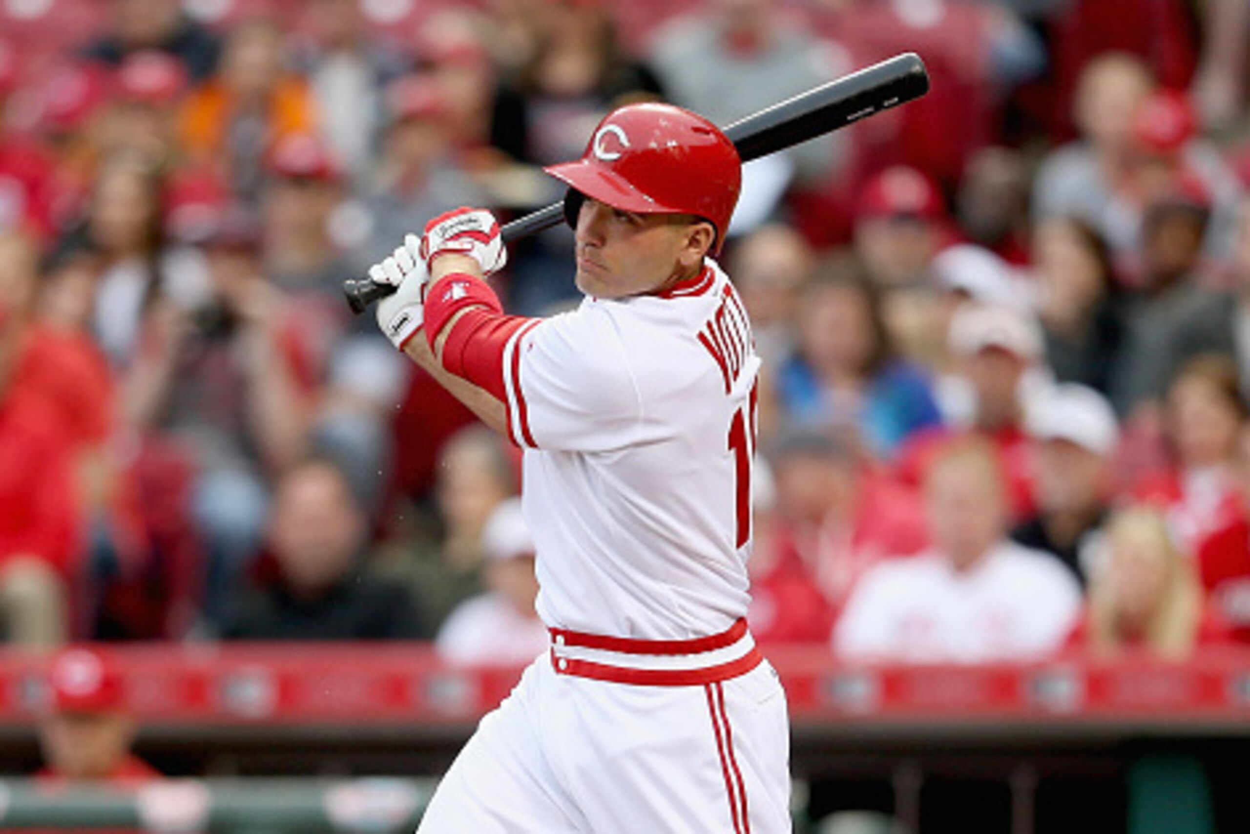 CINCINNATI, OH - APRIL 24:  Joey Votto #19 of the Cincinnati Reds hits a sacrifice ground out in the first inning against the Chicago Cubs at Great American Ball Park on April 24, 2015 in Cincinnati, Ohio.  (Photo by Andy Lyons/Getty Images)