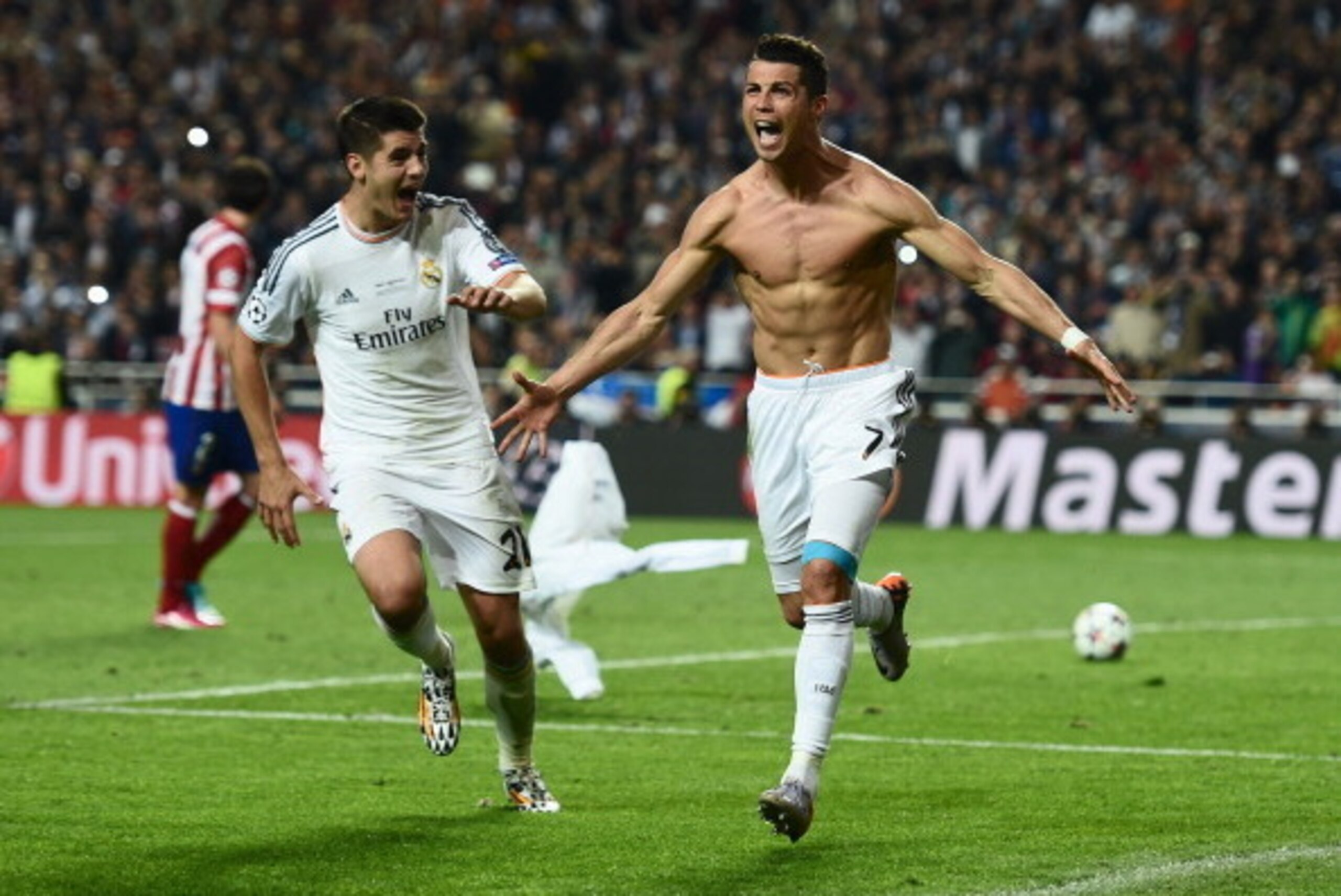 LISBON, PORTUGAL - MAY 24:  Cristiano Ronaldo of Real Madrid celebrates after scoring their fourth goal from the penalty spot during the UEFA Champions League Final between Real Madrid and Atletico de Madrid at Estadio da Luz on May 24, 2014 in Lisbon, Po