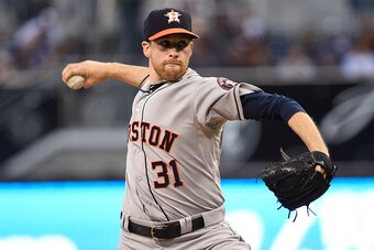 SAN DIEGO, CA - APRIL 27:  Collin McHugh #31 of the Houston Astros pitches during the first inning of a baseball game against the San Diego Padres at Petco Park April 27,  2015 in San Diego, California.  (Photo by Denis Poroy/Getty Images)