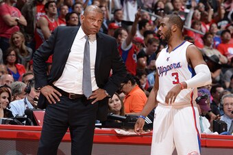 LOS ANGELES, CA - APRIL 28: Doc Rivers and Chris Paul #3 of the Los Angeles Clippers speak during a game against the San Antonio Spurs in Game Five of the Western Conference Quarterfinals during the 2015 NBA Playoffs on April 28, 2015 at Staples Center in