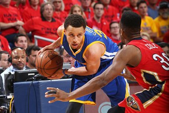 NEW ORLEANS, LA - APRIL 23: Stephen Curry #30 of the Golden State Warriors handles the ball against the New Orleans Pelicans during Game Three of the Western Conference Quarterfinals of the 2015 NBA Playoffs on April 23, 2015 at Smoothie King Center in Ne