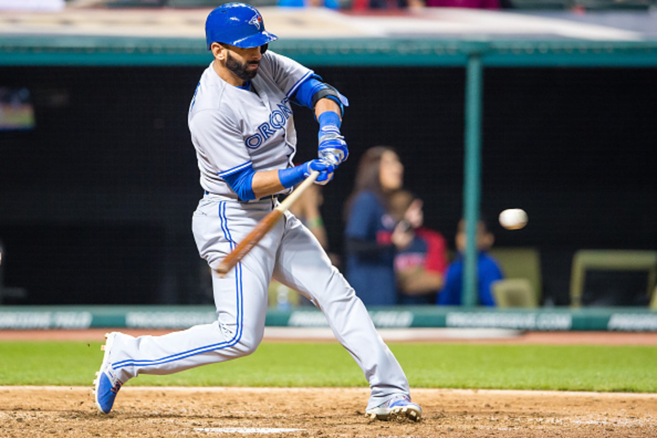CLEVELAND, OH -  MAY 1: Jose Bautista #19 of the Toronto Blue Jays hits a double during the seventh inning against the Cleveland Indians at Progressive Field on May 1, 2015 in Cleveland, Ohio. The Cleveland Indians defeated the Blue Jays 9-4.  (Photo by J
