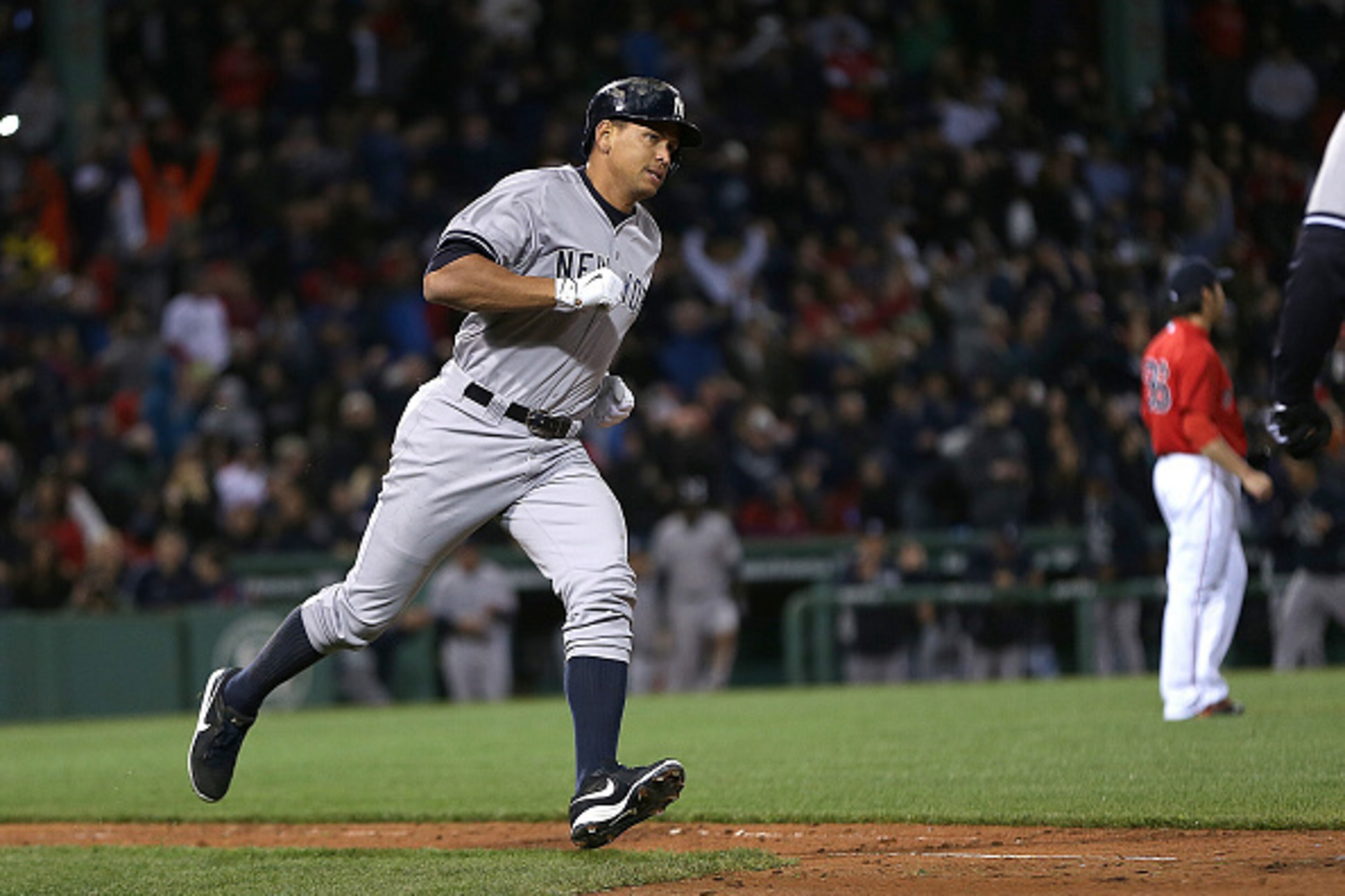 BOSTON, MA - MAY 1:  Alex Rodriguez #13 of the New York rounds the bases after his 660th career home run to tie Willie Mays  in the 8th inning against the Boston Red Sox at Fenway Park May 1, 2015 in Boston, Massachusetts.  (Photo by Jim Rogash/Getty Imag