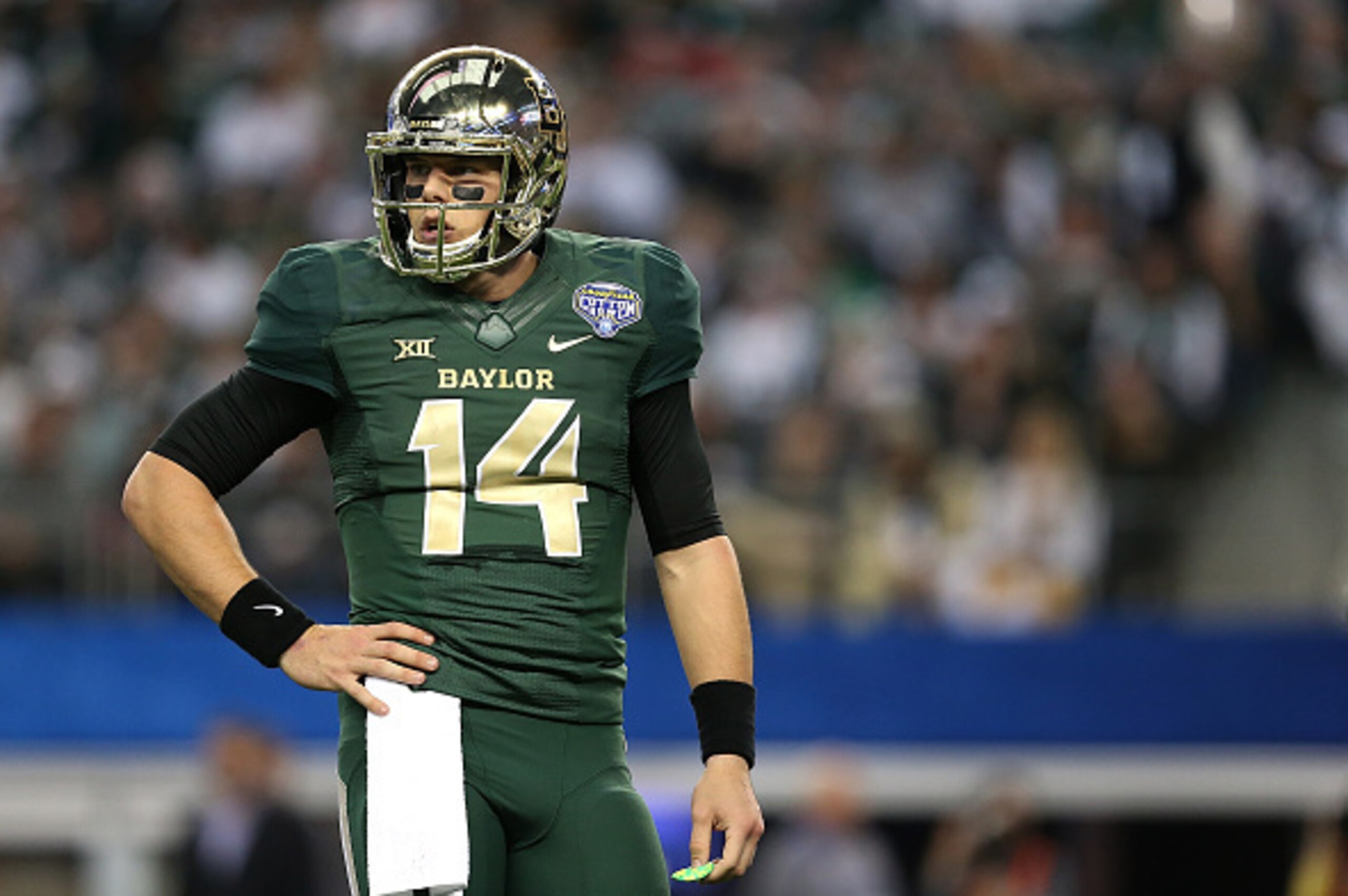 ARLINGTON, TX - JANUARY 01:  Bryce Petty #14 of the Baylor Bears looks on during the Goodyear Cotton Bowl Classic at AT&T Stadium on January 1, 2015 in Arlington, Texas.  (Photo by Sarah Glenn/Getty Images)