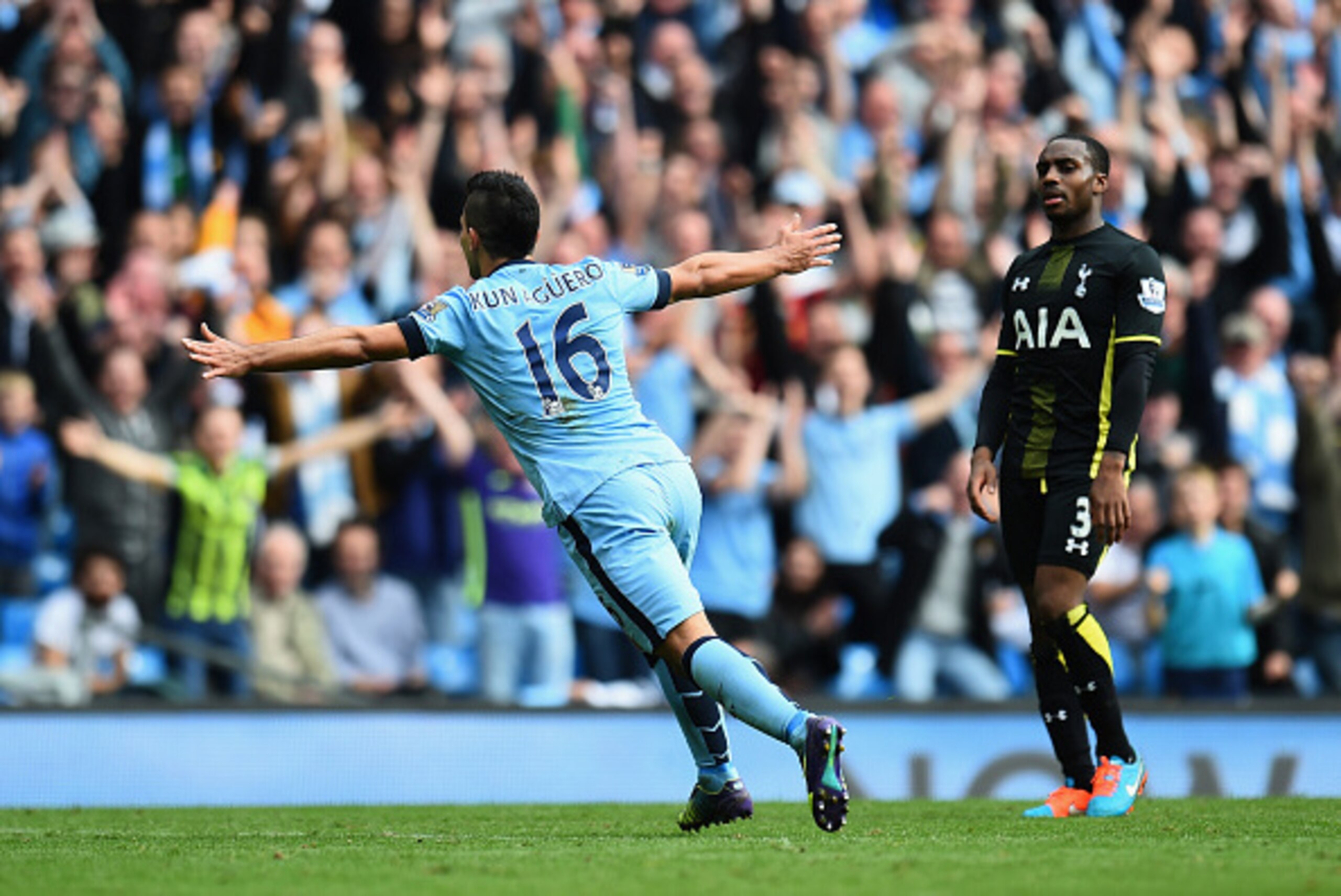MANCHESTER, ENGLAND - OCTOBER 18:  Sergio Aguero of Manchester City celebrates after scoring his fourth goal as Danny Rose of Tottenham Hotspur looks on during the Barclays Premier League match between Manchester City and Tottenham Hotspur at Etihad Stadi