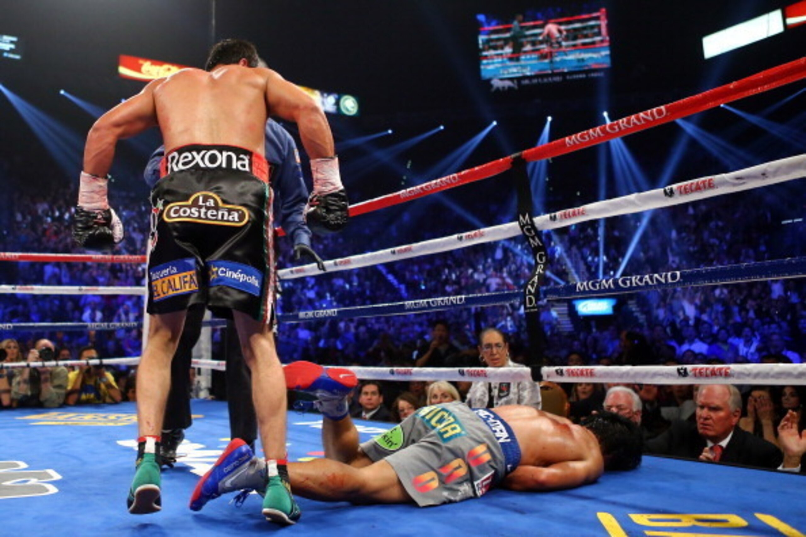 LAS VEGAS, NV - DECEMBER 08:  Manny Pacquiao lays face down on the mat after being knocked out in the sixth round by Juan Manuel Marquez during their welterweight bout at the MGM Grand Garden Arena on December 8, 2012 in Las Vegas, Nevada.  (Photo by Al B