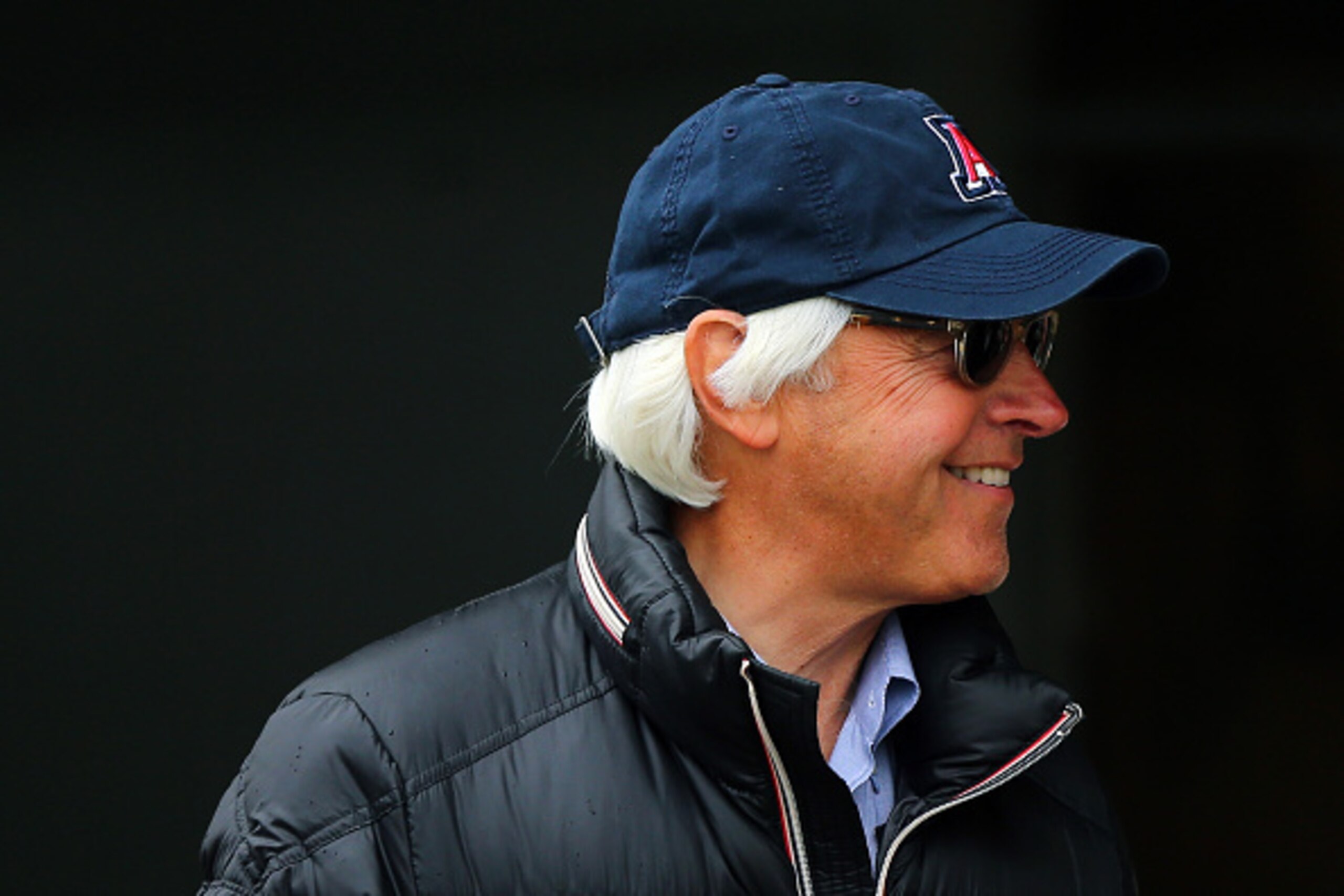 LOUISVILLE, KY - APRIL 30:  Bob Baffert, trainer of Dortmund and American Pharoah, looks on from the stable after morning workouts for the Kentucky Derby at Churchill Downs on April 30, 2015 in Louisville, Kentucky.  (Photo by Elsa/Getty Images)