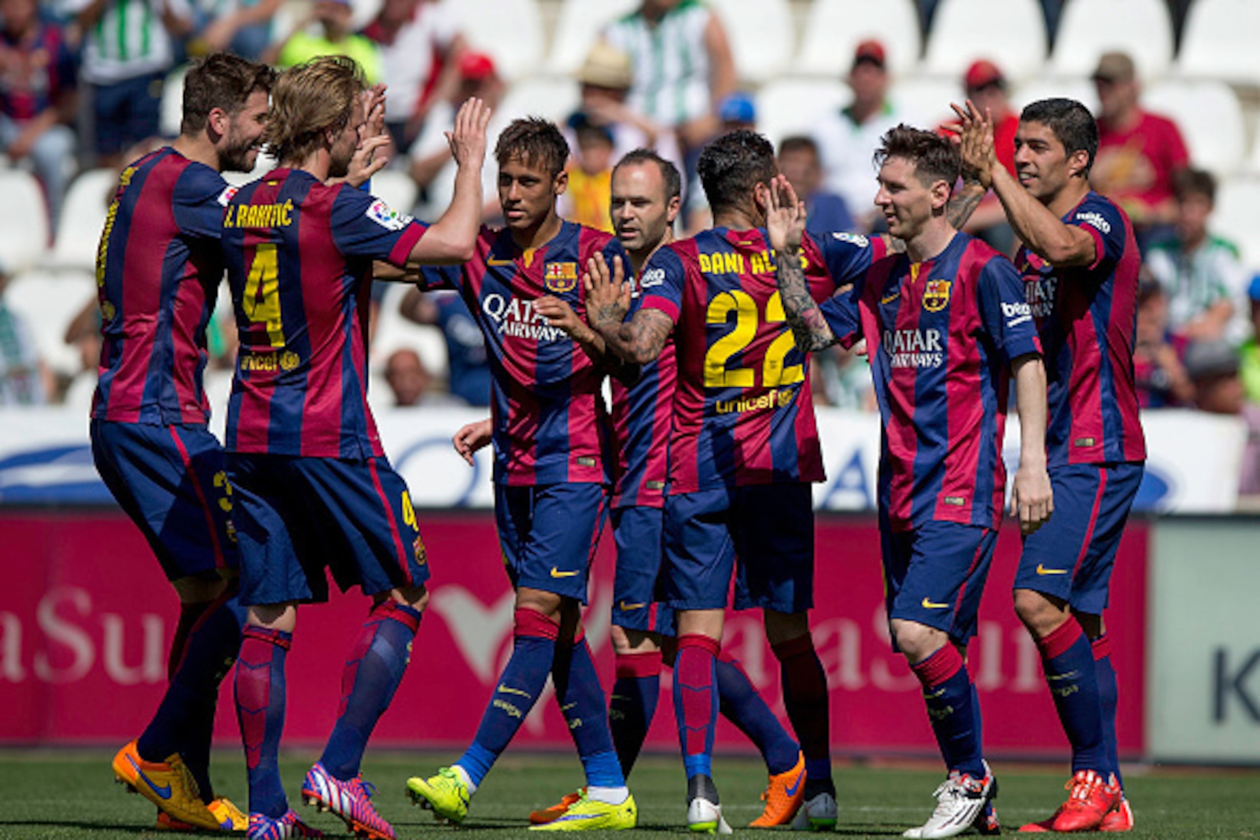 CORDOBA, SPAIN - MAY 02: Luis Suarez (R) of FC Barcelona celebrates scoring their second goal with team-mates as Ivan Rakitic (2ndL), Gerard Pique (L), Neymar JR. (3dL), Andres Iniesta (4thL), Dani Alves (3dR) and Lionel Messi (2ndR) during the La Liga ma